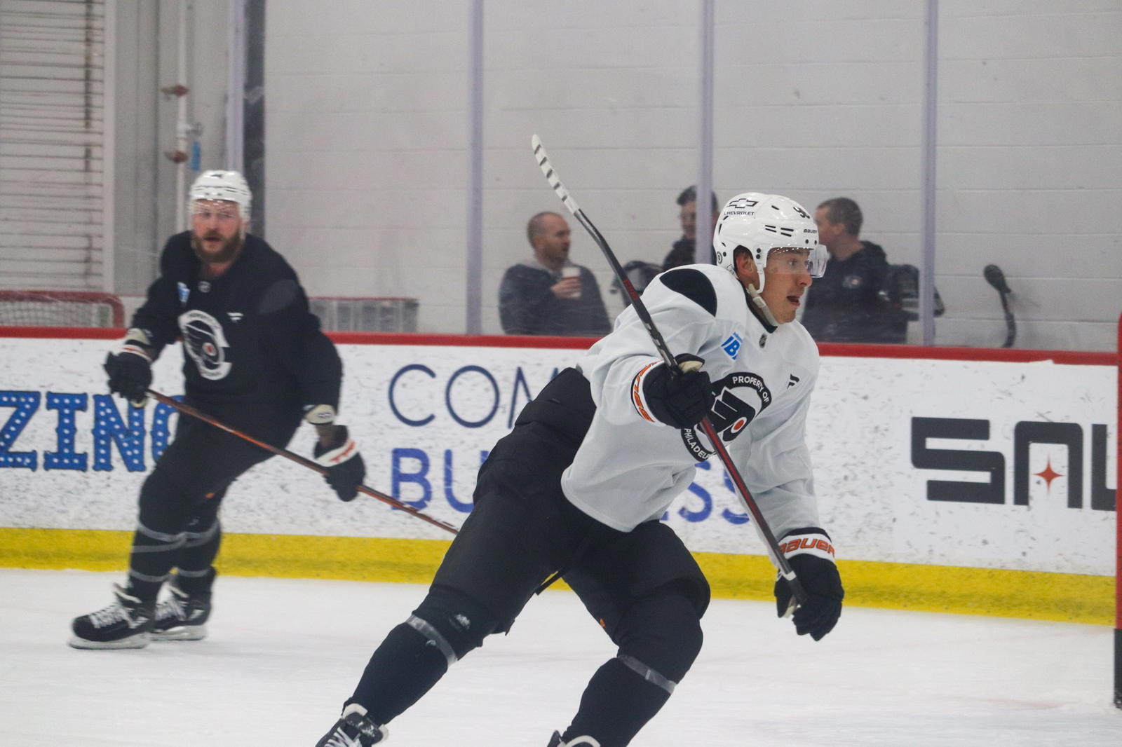 Philadelphia Flyers winger Andrei Kuzmenko (96) during practice with forward Nicolas Delauriers (44) on Feb. 20, 2025. (Megan DeRuchie-The Hockey News)