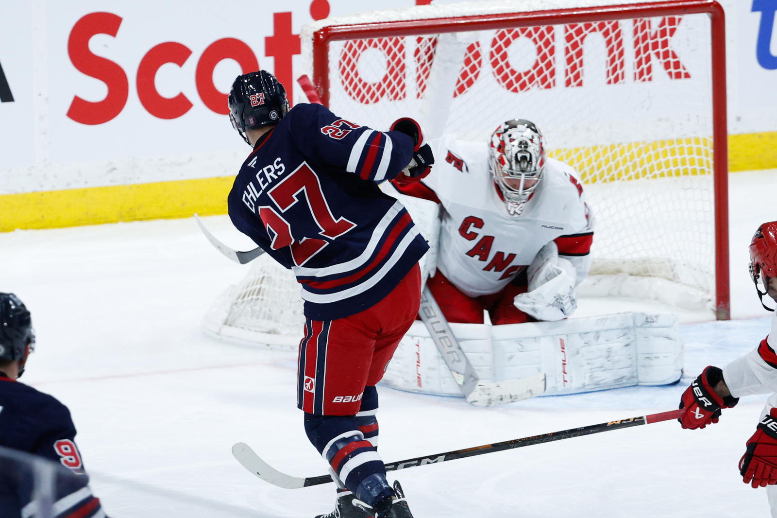 Nikolaj Ehlers and Pyotr Kochetkov (Terrence Lee-Imagn Images)