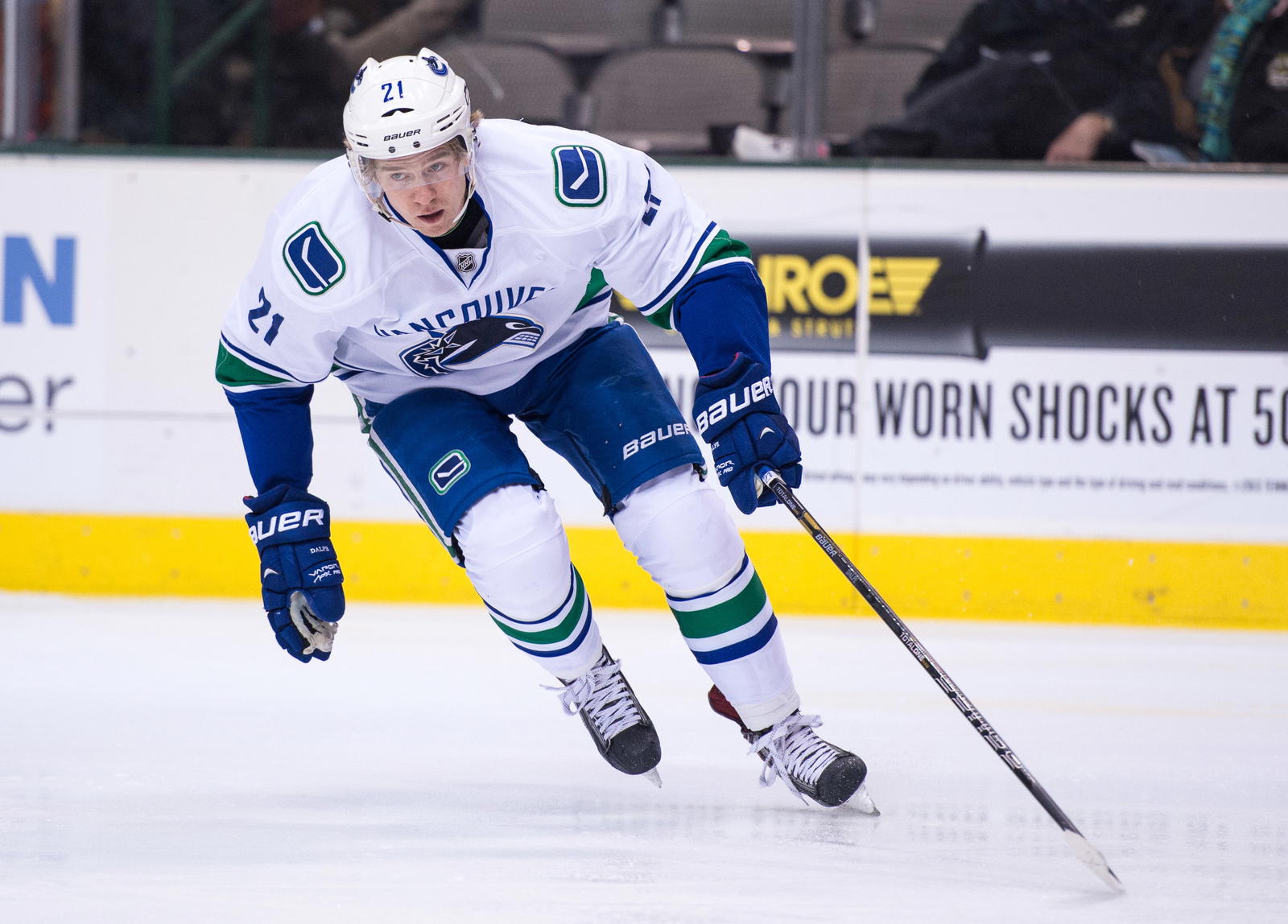 Mar 6, 2014; Dallas, TX, USA; Vancouver Canucks center Zac Dalpe (21) skates against the Dallas Stars during the game at the American Airlines Center. The Stars defeated the Canucks 6-1. Mandatory Credit: Jerome Miron-Imagn Images
