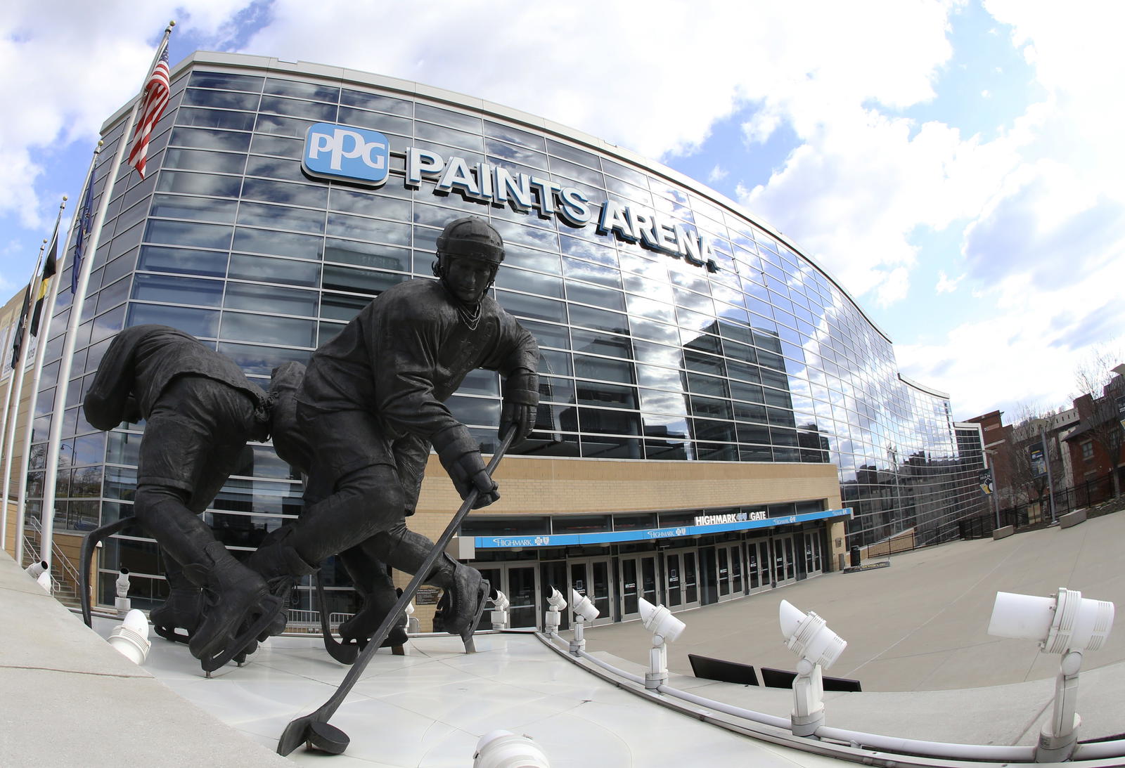 Mar 15, 2020; Pittsburgh, Pennsylvania, USA; General exterior view of the Mario Lemieux statue outside the PPG PAINTS Arena as the NHL game scheduled between the Pittsburgh Penguins and the New York Islanders was suspended due to COVID-19 coronavirus concerns. Mandatory Credit: Charles LeClaire-Imagn Images