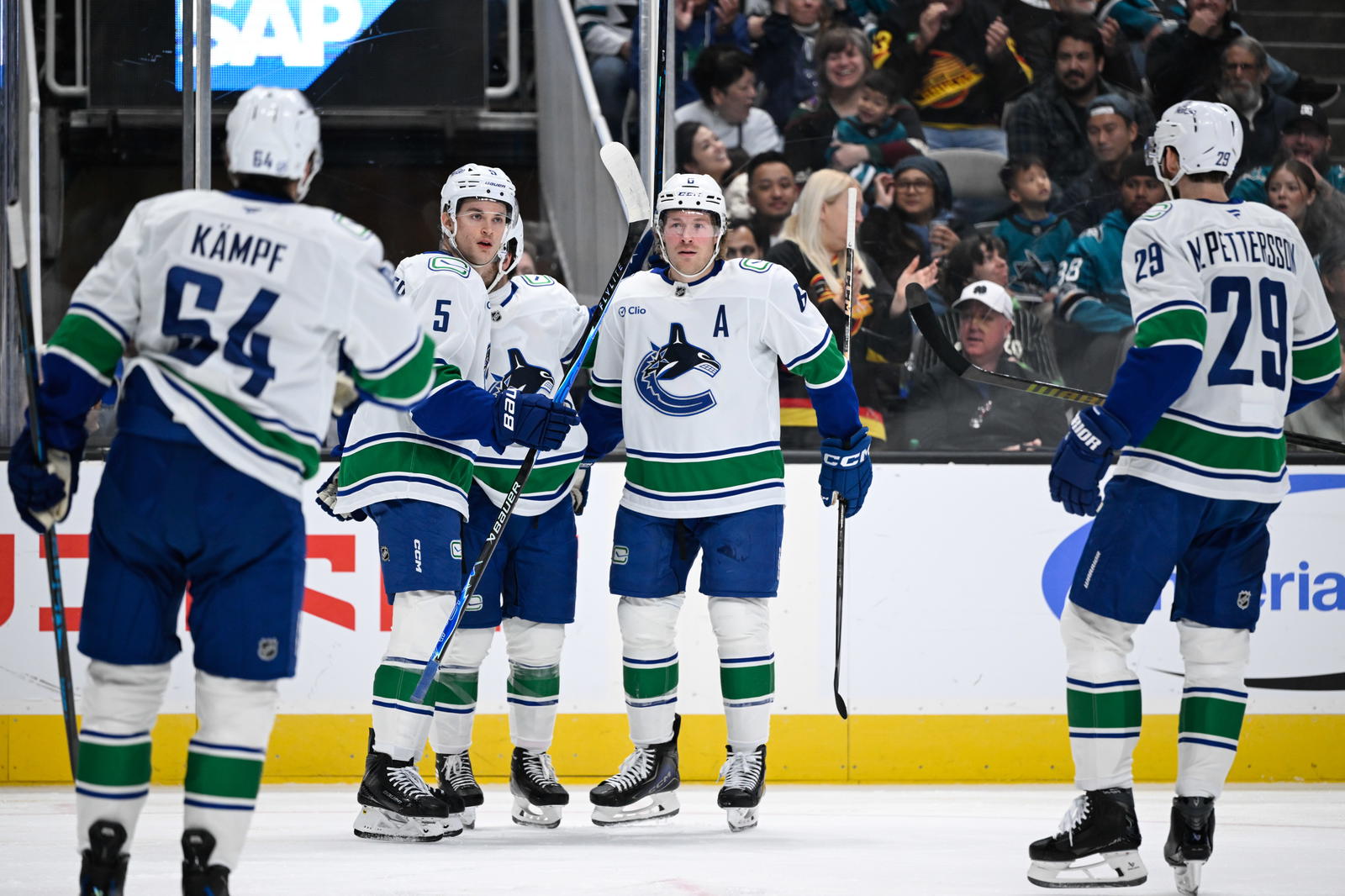 Nov 28, 2025; San Jose, California, USA; Vancouver Canucks right winger Brock Boeser (6) celebrates their goal with teammates against the San Jose Sharks in the first period at SAP Center at San Jose. Mandatory Credit: Eakin Howard-Imagn Images