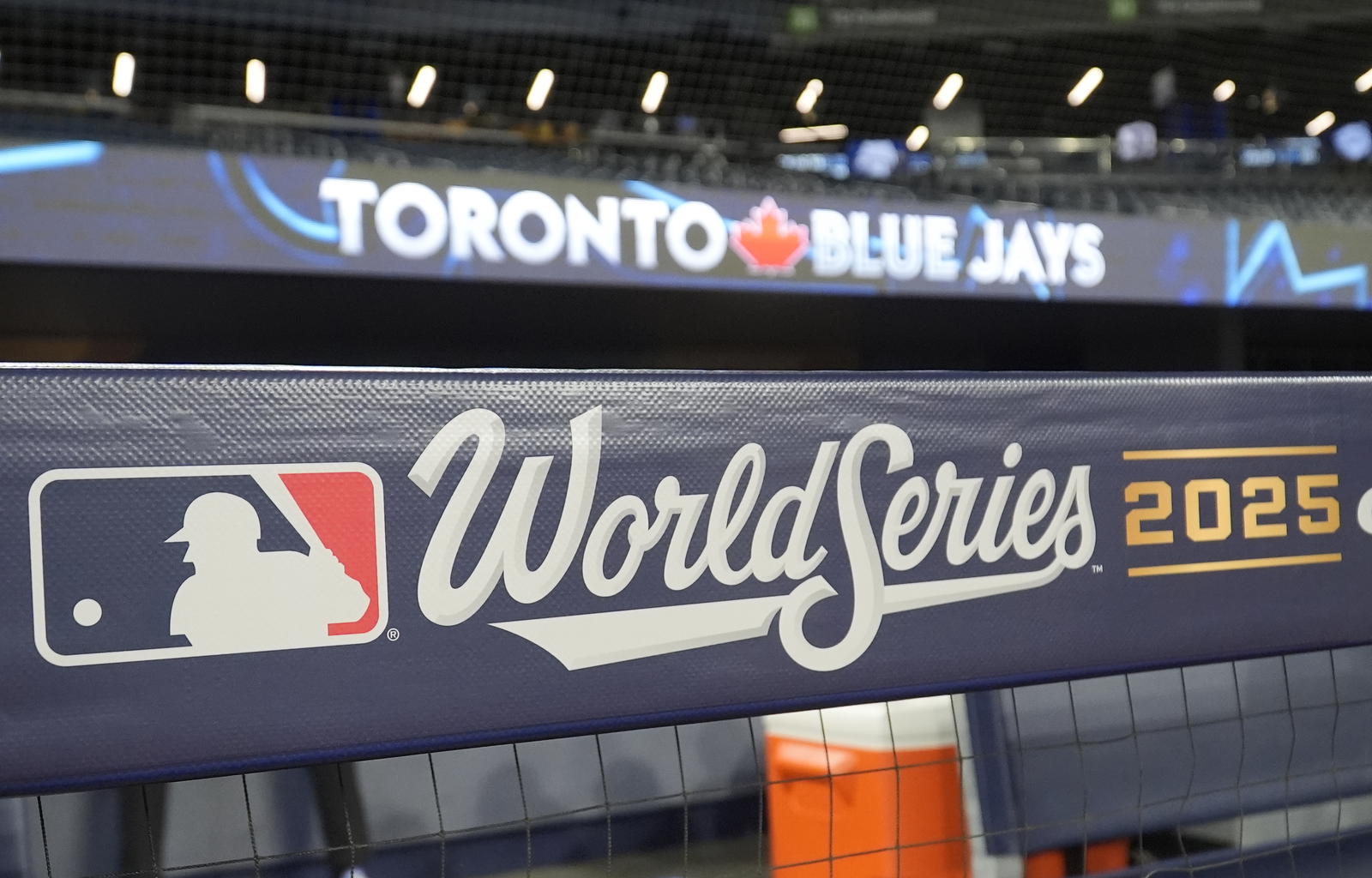 Oct 23, 2025; Toronto, ON, Canada; Signage in place on the dug out before game one of the World Series between the Los Angeles Dodgers and Toronto Blue Jays at Rogers Centre. Mandatory Credit: John E. Sokolowski-Imagn Images