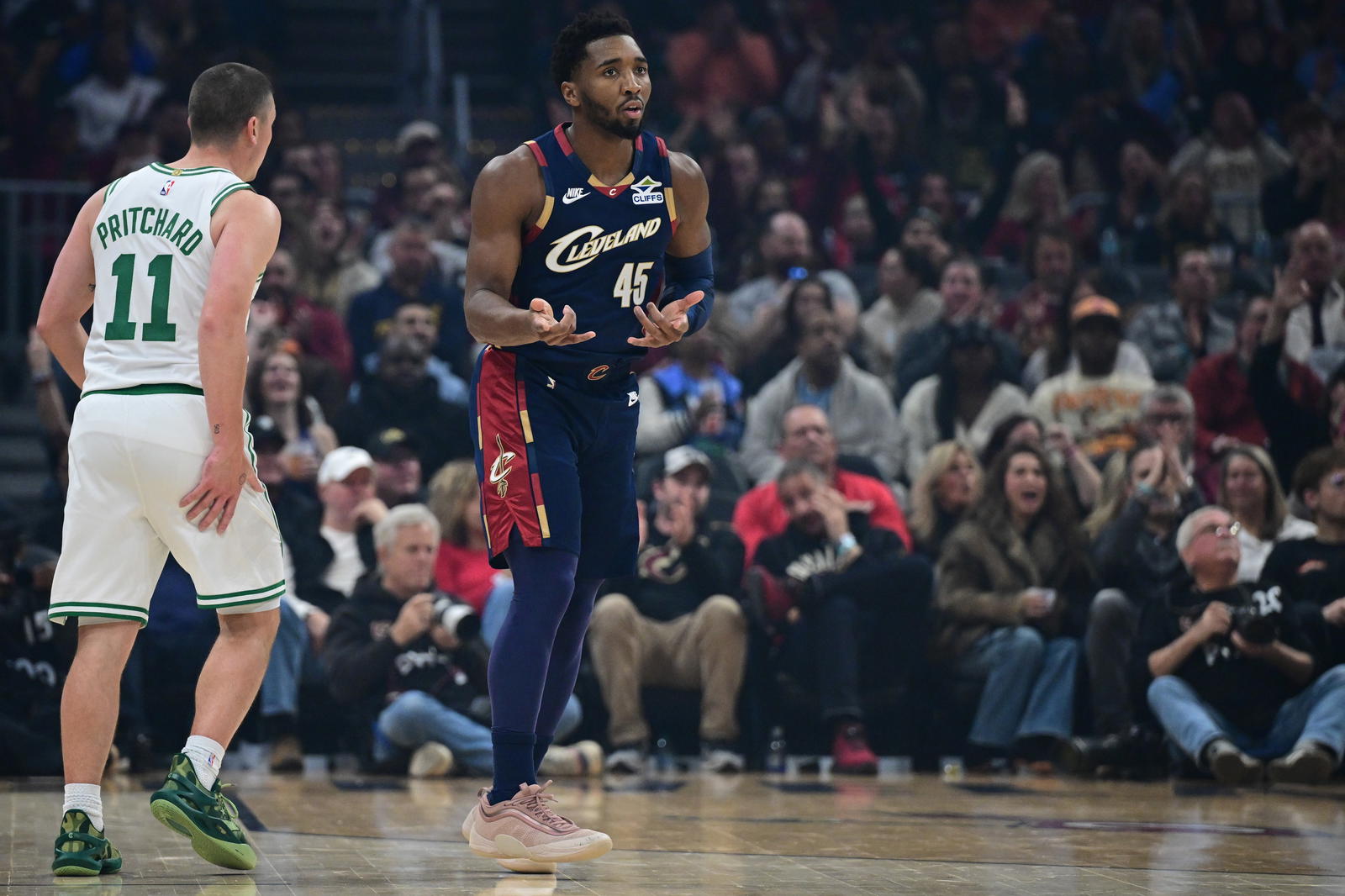 Nov 30, 2025; Cleveland, Ohio, USA; Cleveland Cavaliers guard Donovan Mitchell (45) celebrates after making a three point basket during the first half against the Boston Celtics at Rocket Arena. Mandatory Credit: David Dermer-Imagn Images