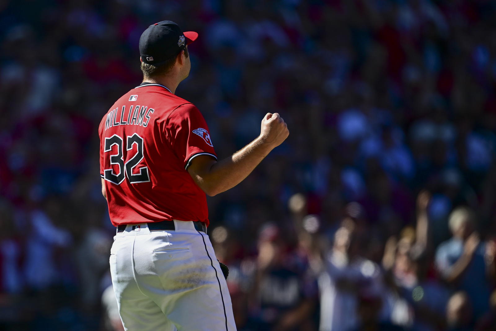 Sep 30, 2025; Cleveland, Ohio, USA; Cleveland Guardians pitcher Gavin Williams (32) reacts after a strikeout on a check swing Detroit Tigers first base Spencer Torkelson (not pictured) in the sixth inning during game one of the Wildcard round for the 2025 MLB playoffs at Progressive Field. Mandatory Credit: David Dermer-Imagn Images