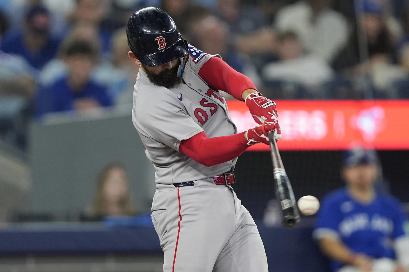 Sep 25, 2025; Toronto, Ontario, CAN; Boston Red Sox catcher Connor Wong (12) makes contact with the ball against the Toronto Blue Jays during the sixth inning at Rogers Centre. (John E. Sokolowski/Imagn Images)
