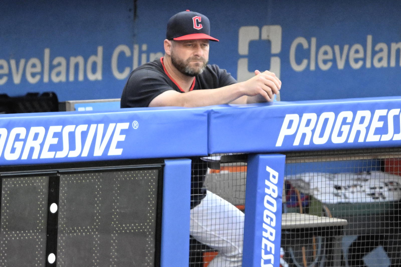 Jul 22, 2025; Cleveland, Ohio, USA; Cleveland Guardians manager Stephen Vogt (12) stands in the dugout in the fifth inning against the Baltimore Orioles at Progressive Field. Mandatory Credit: David Richard-Imagn Images