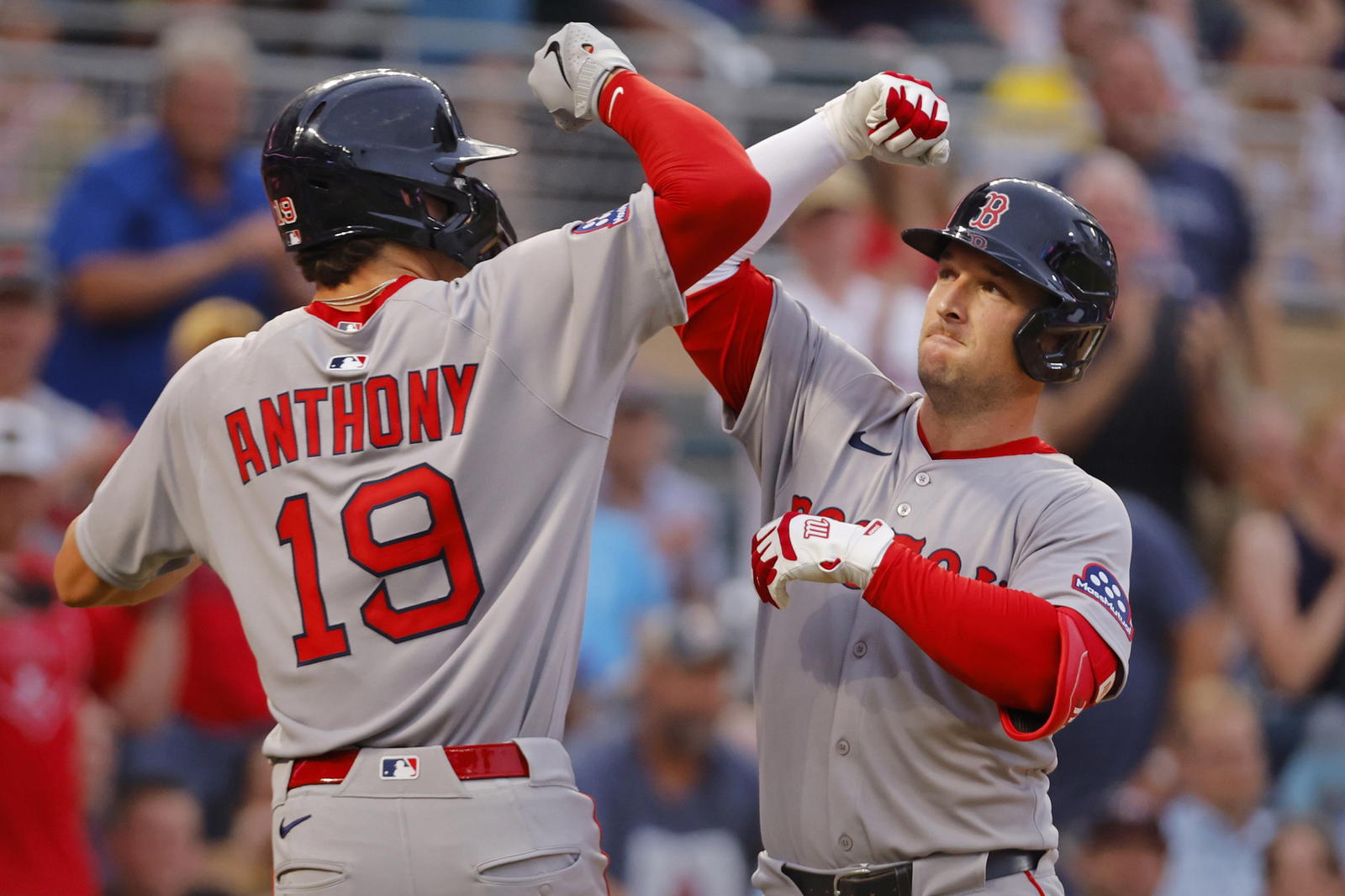 Jul 28, 2025; Minneapolis, Minnesota, USA; Boston Red Sox third baseman Alex Bregman (2) celebrates his three run home run against the Minnesota Twins with left fielder Roman Anthony (19) in the fifth inning at Target Field. (Bruce Kluckhohn/Imagn Images)
