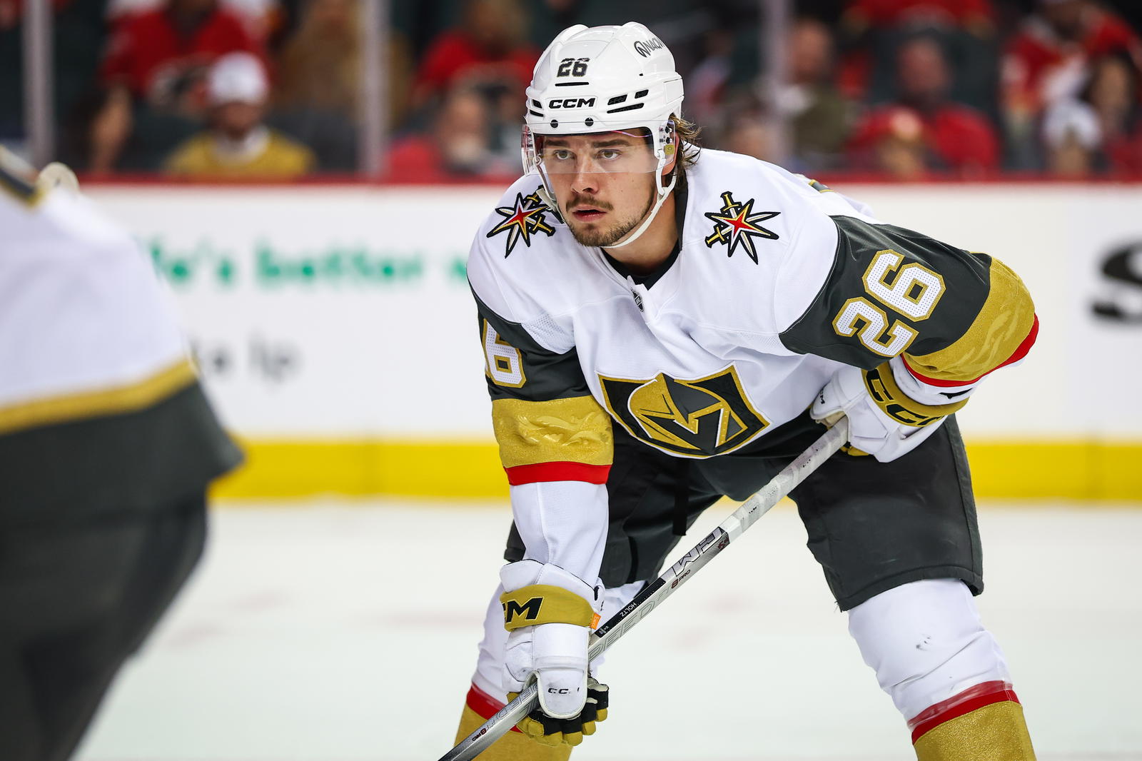 Vegas Golden Knights right wing Alexander Holtz (26) against the Calgary Flames during the third period at Scotiabank Saddledome. Mandatory Credit: Sergei Belski-Imagn Images