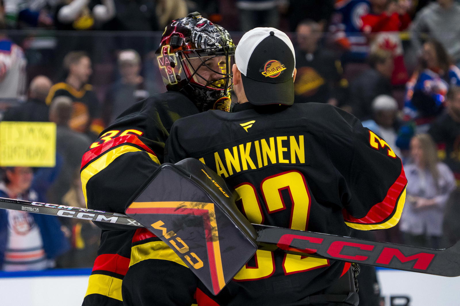 Jan 18, 2025; Vancouver, British Columbia, CAN; Vancouver Canucks goalie Thatcher Demko (35) and goalie Kevin Lankinen (32) celebrate thier victory against the Edmonton Oilers at Rogers Arena. Mandatory Credit: Bob Frid-Imagn Images