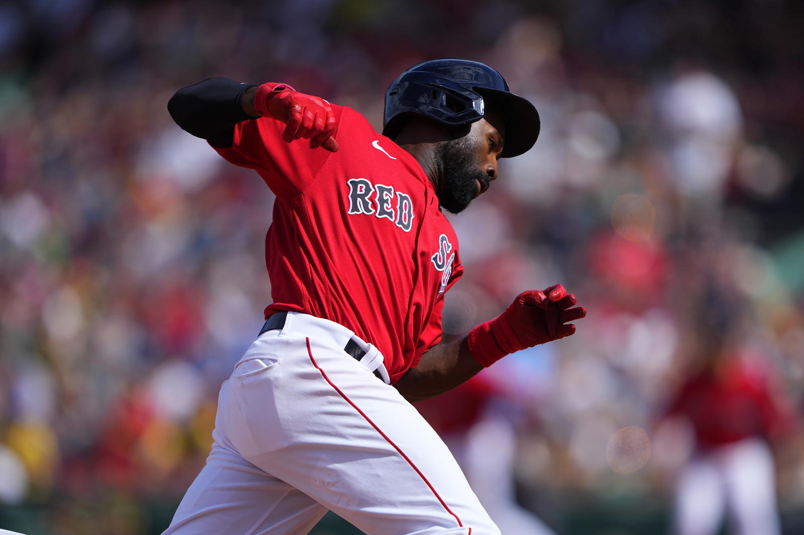 Boston Red Sox right fielder Jackie Bradley Jr. (19) rounds third base and scores a run against the Milwaukee Brewers on an RBI single hit by right fielder Jaylin Davis (not pictured) during the sixth inning at Fenway Park. Gregory Fisher-Imagn Images