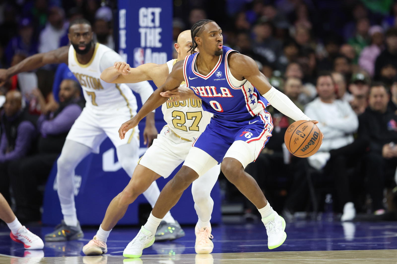 Nov 11, 2025; Philadelphia, Pennsylvania, USA; Philadelphia 76ers guard Tyrese Maxey (0) controls the ball against Boston Celtics guard Jordan Walsh (27) during the second quarter at Xfinity Mobile Arena. (Bill Streicher/Imagn Images)