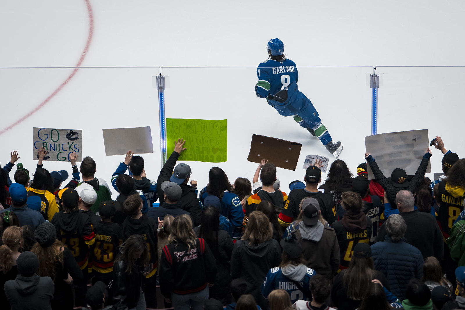 Mar 16, 2025; Vancouver, British Columbia, CAN; Vancouver Canucks forward Conor Garland (8) handles the puck during warm up prior to a game against the Utah Hockey Club at Rogers Arena. Mandatory Credit: Bob Frid-Imagn Images