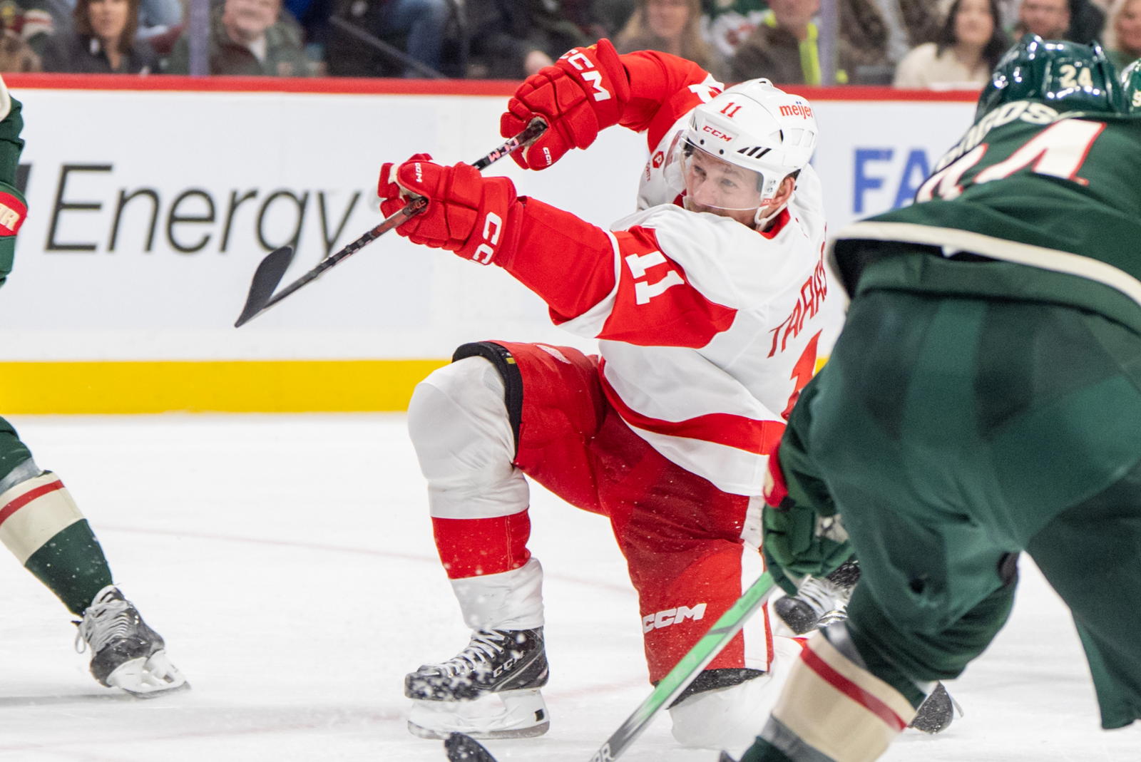 Feb 25, 2025; Saint Paul, Minnesota, USA; Detroit Red Wings right wing Vladimir Tarasenko (11) shoots against the Minnesota Wild in the third period at Xcel Energy Center. Mandatory Credit: Matt Blewett-Imagn Images.