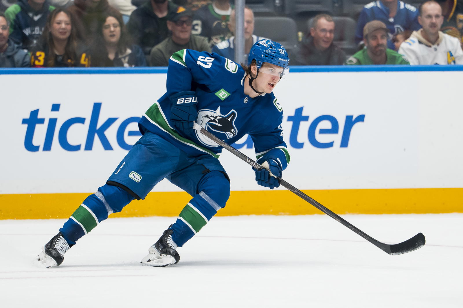 Sep 26, 2025; Vancouver, British Columbia, CAN; Vancouver Canucks forward Vitali Kravtsov (92) skates against the Seattle Kraken in the third period at Rogers Arena. Mandatory Credit: Bob Frid-Imagn Images