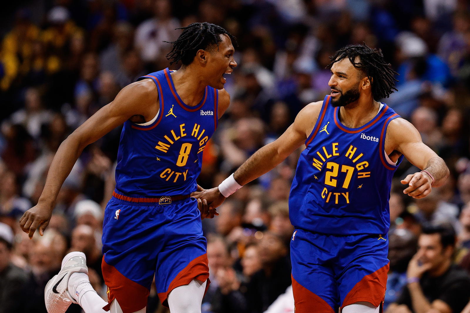Denver Nuggets guard Peyton Watson (8) reacts with guard Jamal Murray (27) in the second quarter against the Golden State Warriors at Ball Arena.&nbsp;Isaiah J. Downing-Imagn Images
