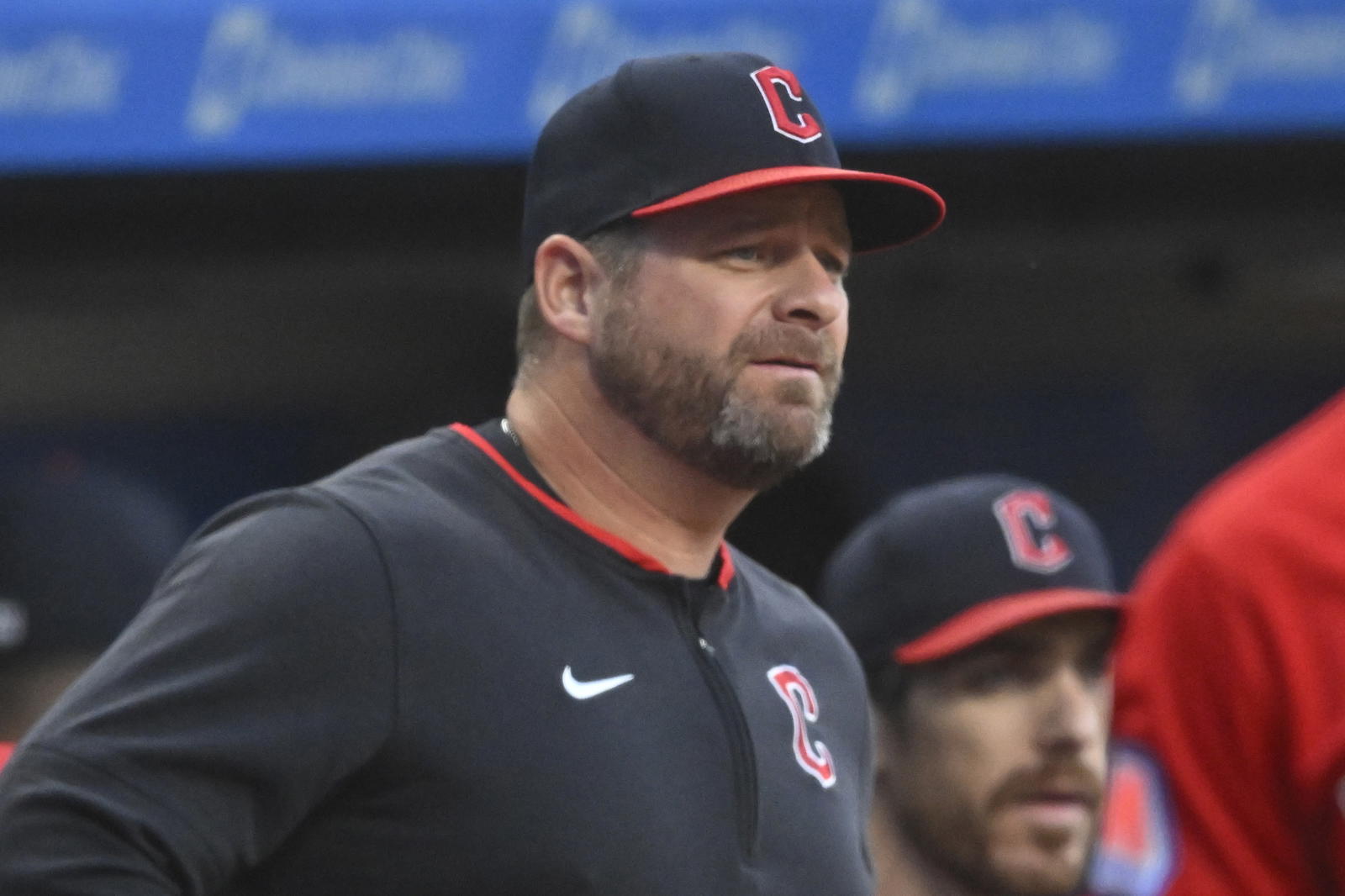 Sep 25, 2025; Cleveland, Ohio, USA; Cleveland Guardians manager Stephen Vogt (12) stands on the steps of the dugout in the first inning against the Detroit Tigers at Progressive Field. Mandatory Credit: David Richard-Imagn Images