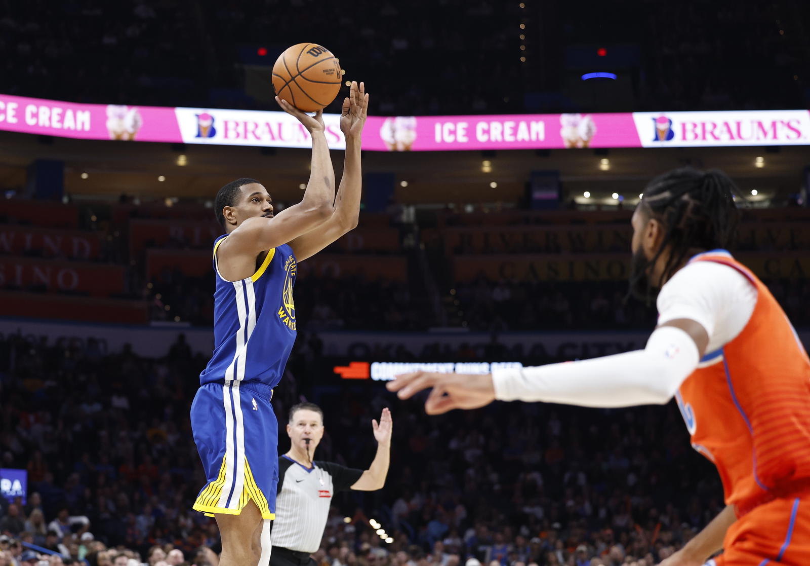Golden State Warriors guard De'Anthony Melton (8) shoots a three point basket against the Oklahoma City Thunder during the second half at Paycom Center. Alonzo Adams-Imagn Images
