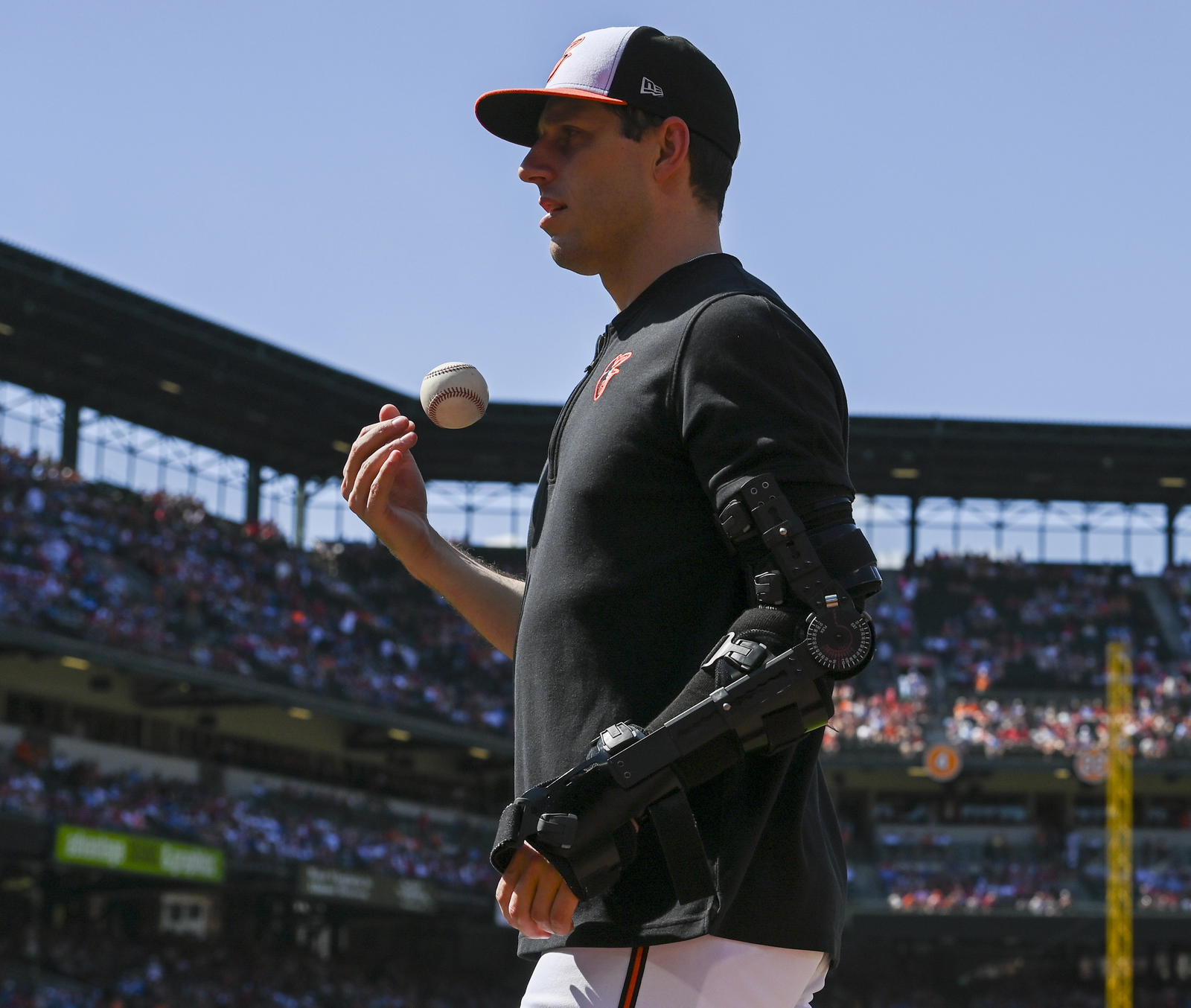 Jun 15, 2024; Baltimore, Maryland, USA; Baltimore Orioles pitch John Means walks to the dugout before the game against the Philadelphia Phillies at Oriole Park at Camden Yards. Mandatory Credit: Tommy Gilligan-Imagn Images