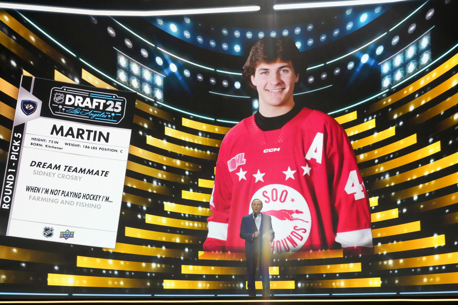 Jun 27, 2025; Los Angeles, California, USA; NHL Commissioner Gary Bettman announces Brady Martin is selected as the fifth overall pick to the Nashville Predators in the first round of the 2025 NHL Draft at Peacock Theater. Mandatory Credit: Kirby Lee-Imagn Images