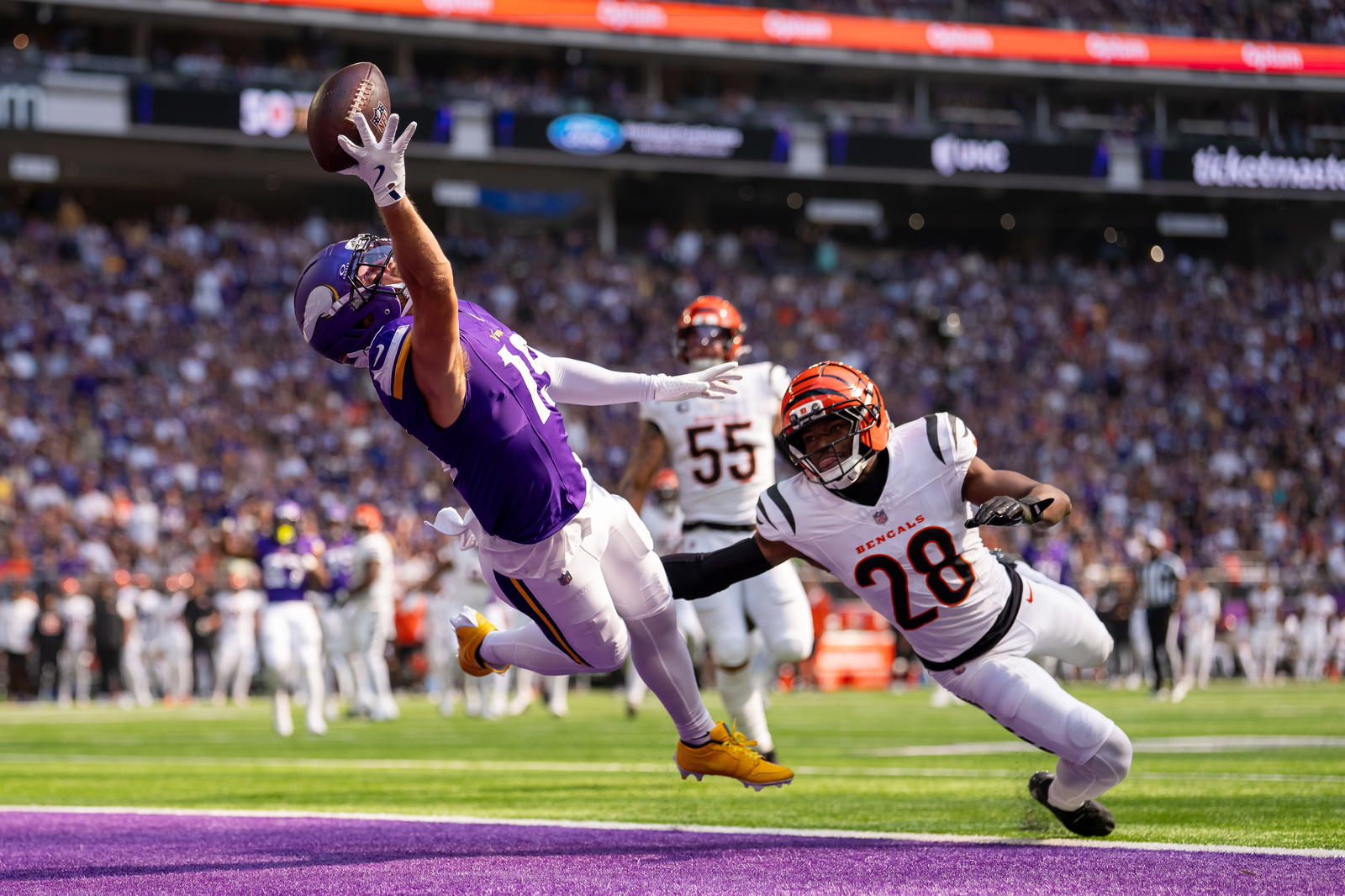 Minnesota Vikings wide receiver Adam Thielen (19) is unable to make the catch as Cincinnati Bengals cornerback Josh Newton (28) defends during the first half at U.S. Bank Stadium. <br>Brad Rempel-Imagn Images