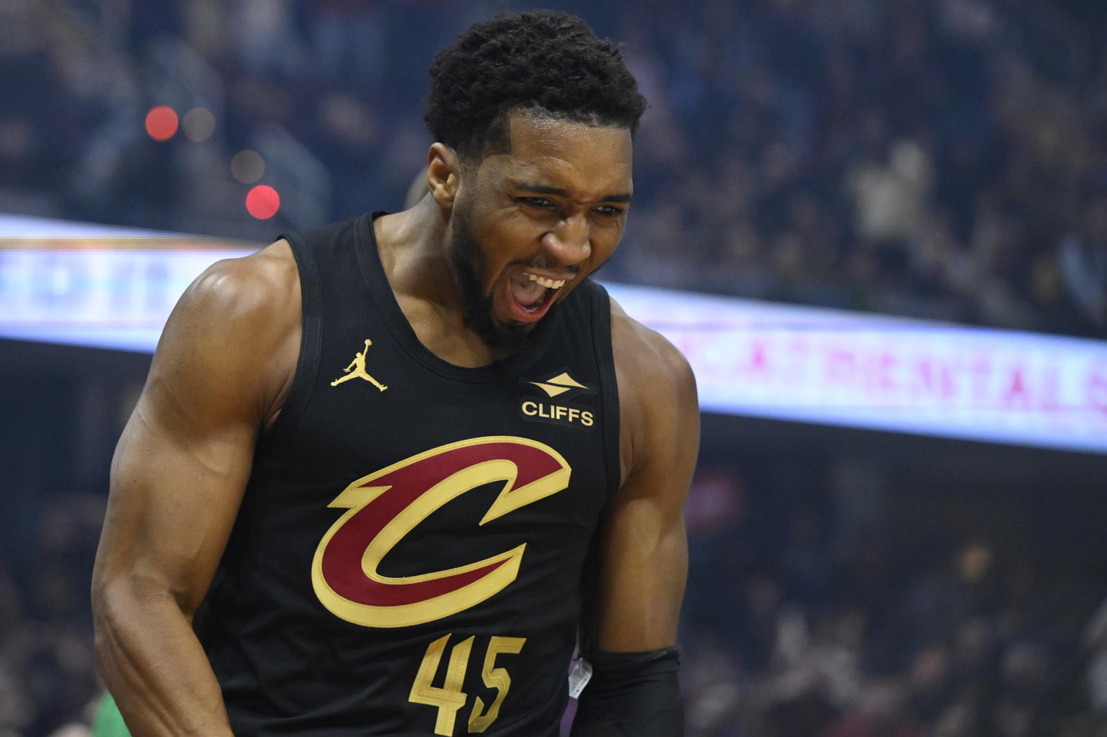 Feb 4, 2025; Cleveland, Ohio, USA; Cleveland Cavaliers guard Donovan Mitchell (45) celebrates after a dunk in the first quarter against the Boston Celtics at Rocket Mortgage FieldHouse. Mandatory Credit: David Richard-Imagn Images
