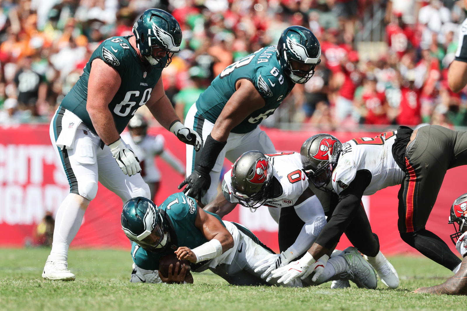 Eagles quarterback Jalen Hurts is sacked by Tampa Bay defensive tackle Vita Vea) during the second half - one of two Vea sacks. @ Kim Klement-Neitzel
