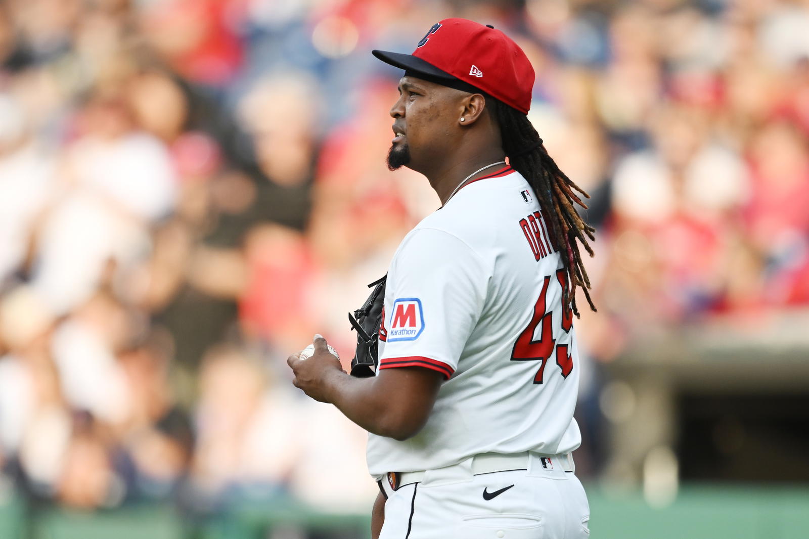 Jun 9, 2025; Cleveland, Ohio, USA; Cleveland Guardians starting pitcher Luis Ortiz (45) reacts after giving up a home run during the fourth inning against the Cincinnati Reds at Progressive Field. Mandatory Credit: Ken Blaze-Imagn Images