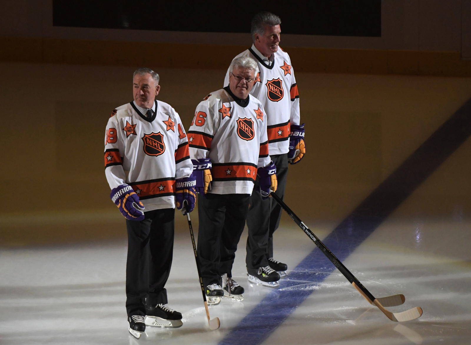 Oct 14, 2016; Los Angeles, CA, USA; Los Angeles Kings former players Dave Taylor (left), Marcel Dionne (center) and Charlie Simmer are introduced during a NHL game against the Philadelphia Flyers at Staples Center. © Kirby Lee-Imagn Images