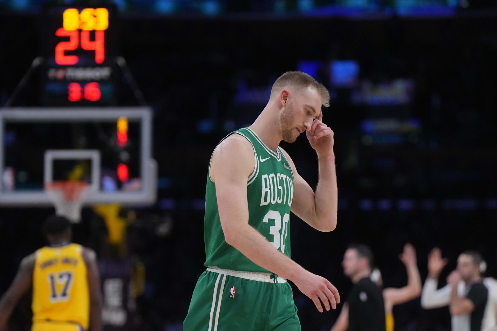 Jan 23, 2025; Los Angeles, California, USA; Boston Celtics forward Sam Hauser (30) reacts in the second half against the Los Angeles Lakers at the Crypto.com Arena. (Kirby Lee/Imagn Images)