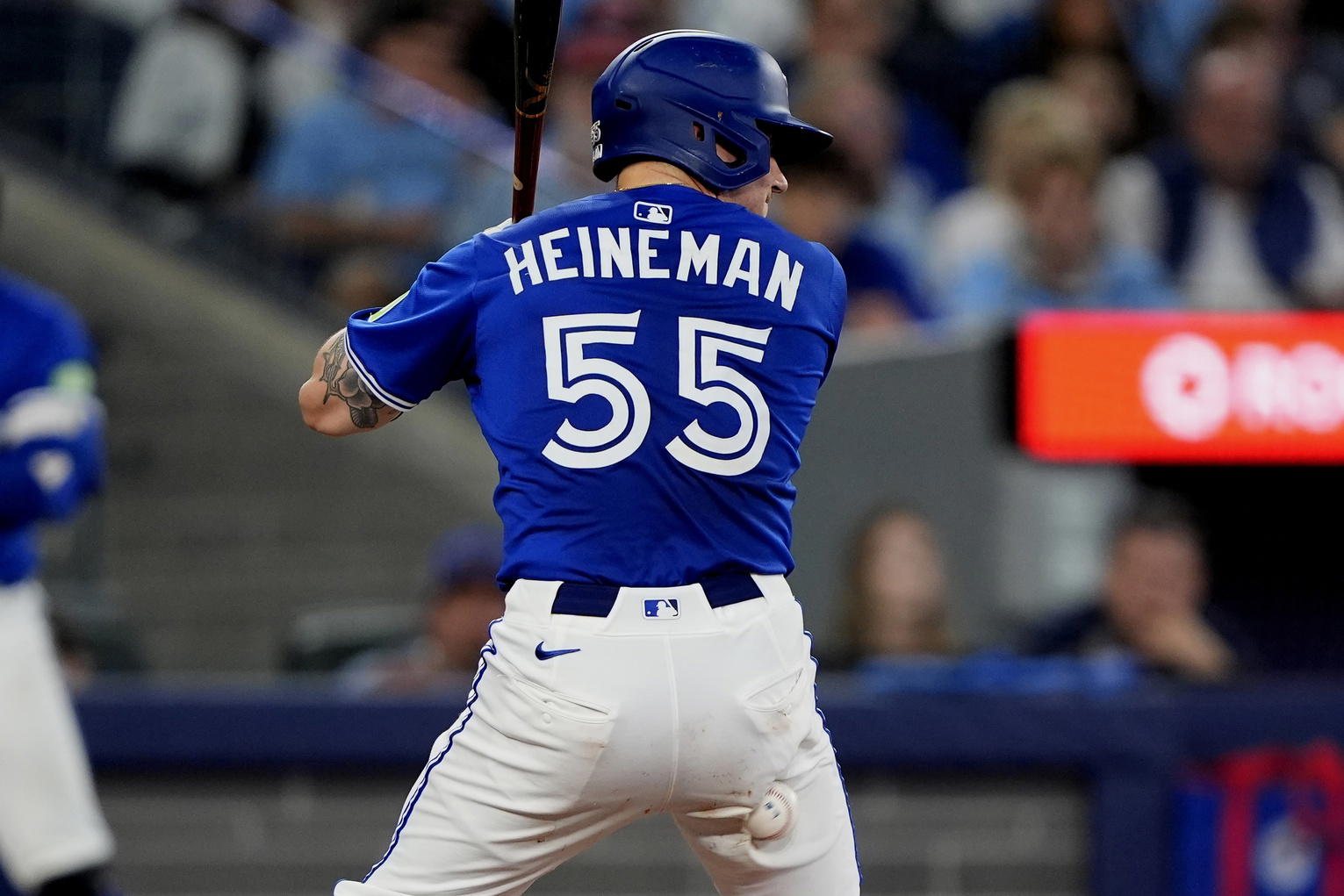 Sep 25, 2025; Toronto, Ontario, CAN; Toronto Blue Jays catcher Tyler Heineman (55) gets hit by a putch from Boston Red Sox starting pitcher Brayan Bello (not pictured)during the fifth inning at Rogers Centre. (John E. Sokolowski/Imagn Images)