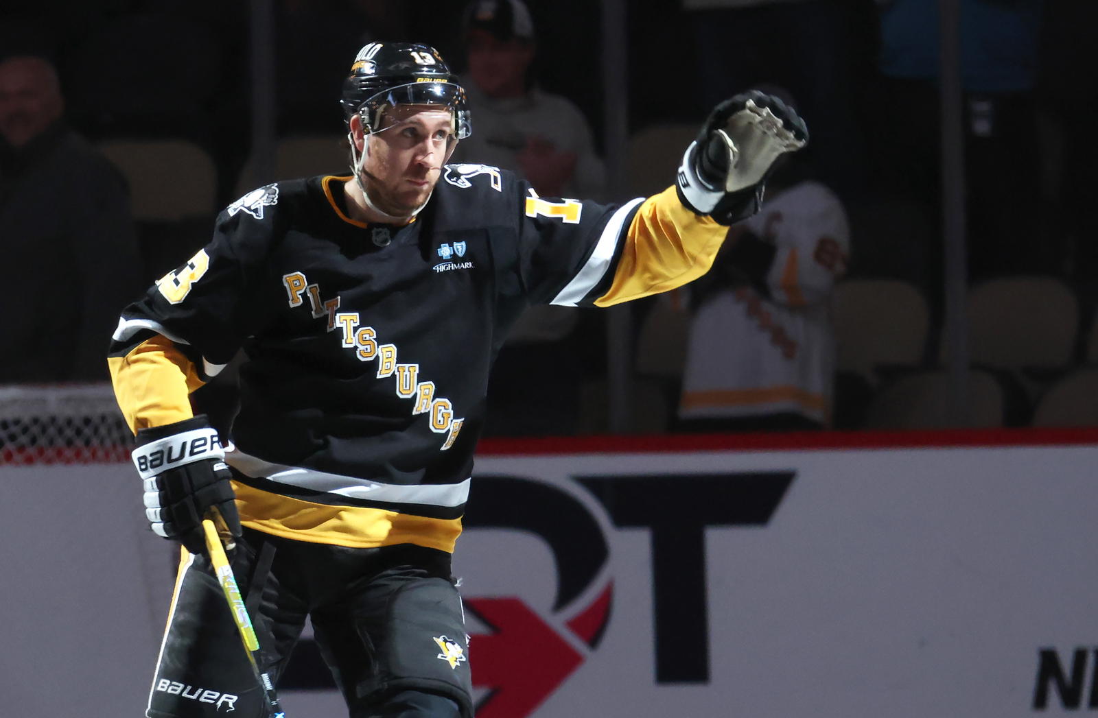 Apr 8, 2025; Pittsburgh, Pennsylvania, USA; Pittsburgh Penguins right wing Kevin Hayes (13) reacts after being named first star of the game against the Chicago Blackhawks at PPG Paints Arena. Mandatory Credit: Charles LeClaire-Imagn Images