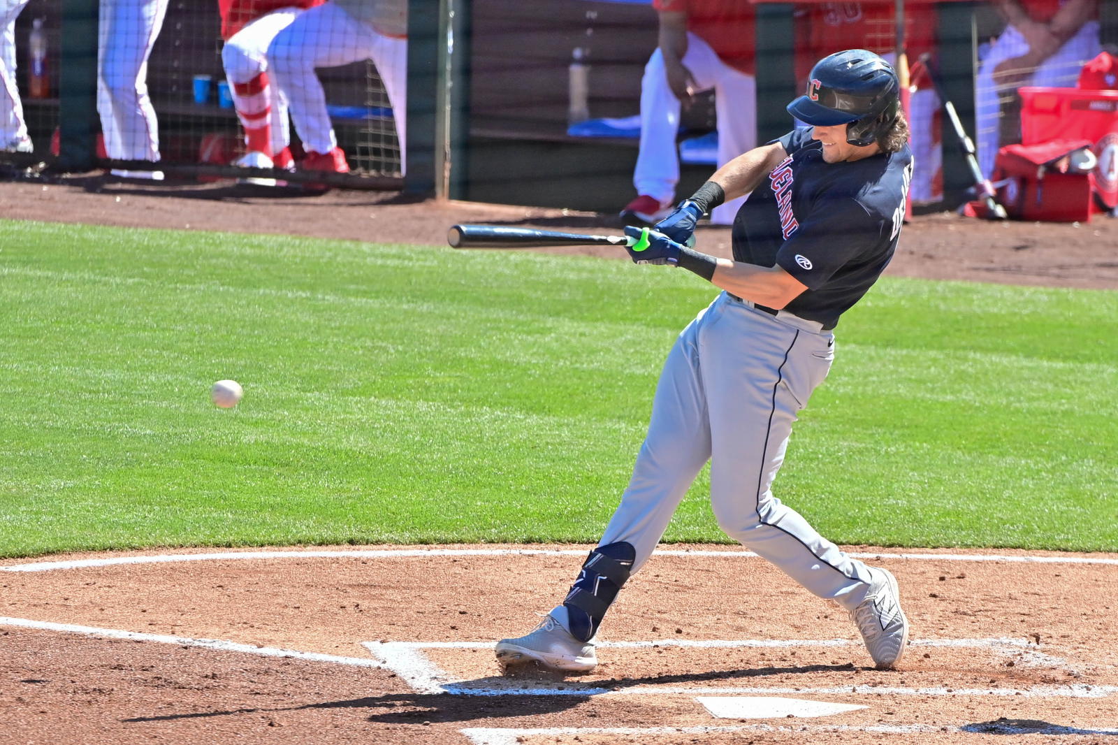 Feb 29, 2024; Tempe, Arizona, USA; Cleveland Guardians right fielder Chase DeLauter (6) grounds out in the third inning against the Los Angeles Angels during a spring training game at Tempe Diablo Stadium. Mandatory Credit: Matt Kartozian-Imagn Images