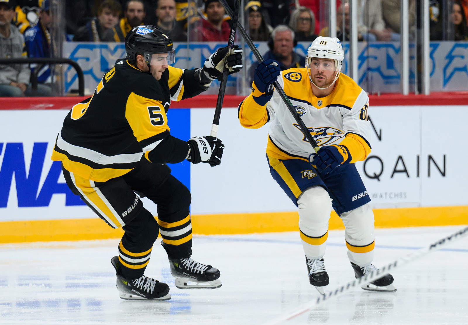 Nov 16, 2025; Stockholm, SWEDEN; Pittsburgh Penguins defenseman Ryan Shea (5) in action against Nashville Predators center Jonathan Marchessault (81) in a Global Series ice hockey game at Avicii Arena. Mandatory Credit: Per Haljestam-Imagn Images