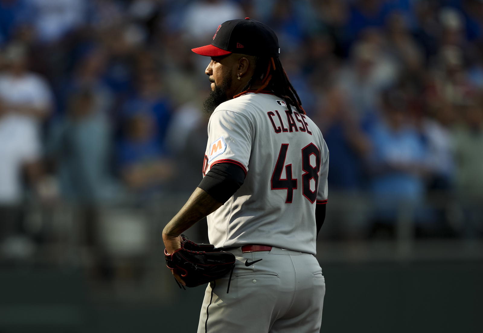 Mar 27, 2025; Kansas City, Missouri, USA; Cleveland Guardians relief pitcher Emmanuel Clase (48) pitches during the ninth inning against the Kansas City Royals at Kauffman Stadium. Mandatory Credit: Jay Biggerstaff-Imagn Images