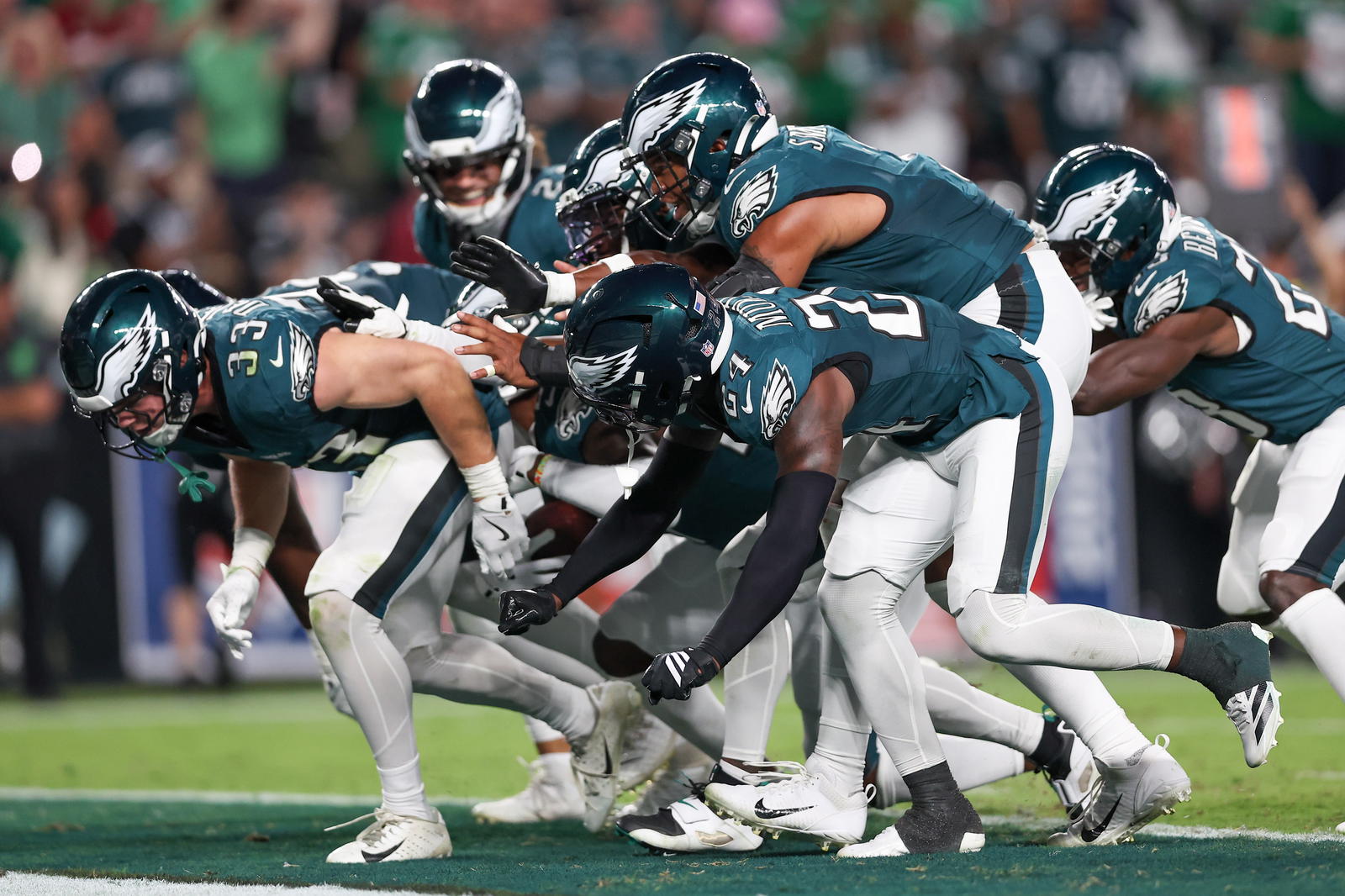 The Philadelphia Eagles' defense celebrates a forced turnover against the Dallas Cowboys. Credit: Bill Streicher-Imagn Images