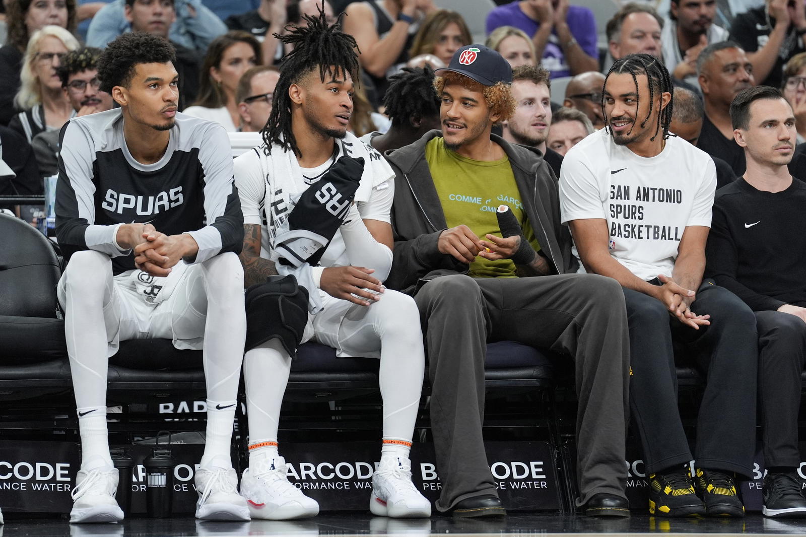 San Antonio Spurs players Victor Wembanyama, Stephon Castle, Jeremy Sochan and Tre Jones on the bench. Credit: Daniel Dunn-Imagn Images.