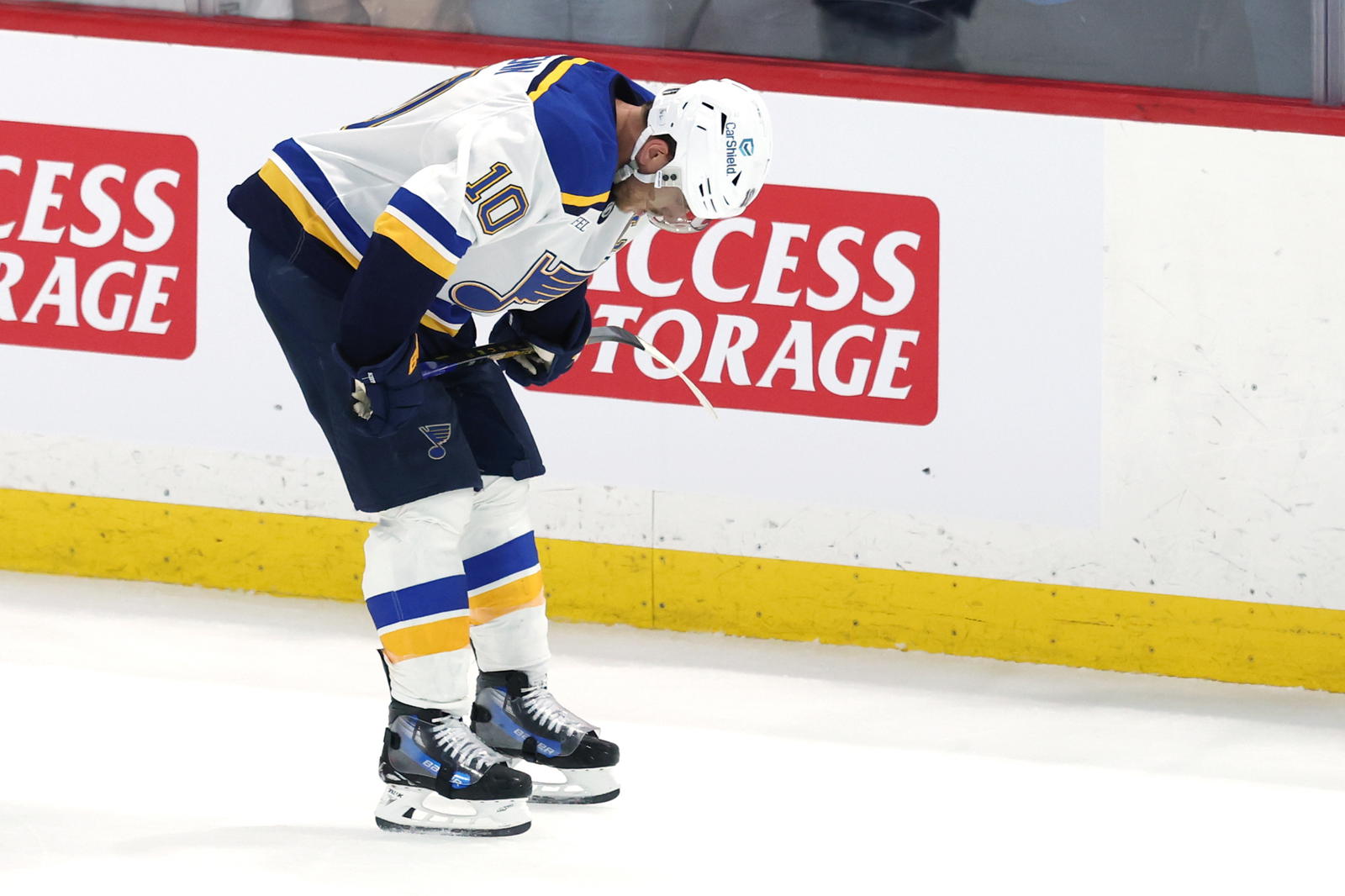 A despondent St. Louis Blues captain Brayden Schenn in the immediate moment after suffering a 4-3 double overtime loss against the Winnipeg Jets in Game 7 of the Western Conference First Round on Sunday. (James Carey Lauder-Imagn Images)