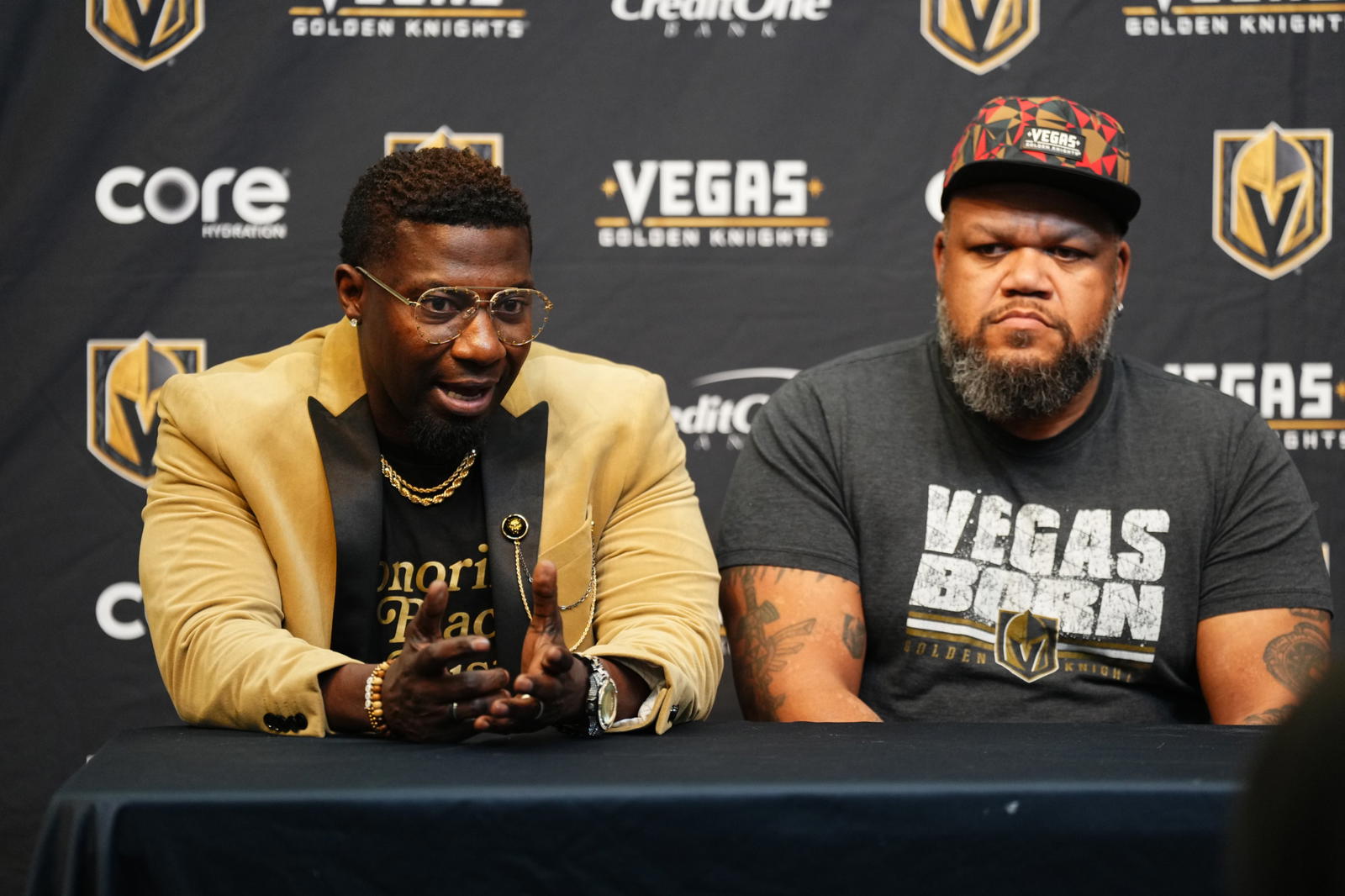<i>"I think representation matters. So it's an awesome feeling to know that we're leading in the right direction, and we're definitely representing, not just for ourselves, our families, but also for the organization," emcee Robert "Bojo"&nbsp;Ackah (left), sitting alongside singer Carnell Johnson. <b style="">PHOTO COURTESY: Golden Knights</b></i>