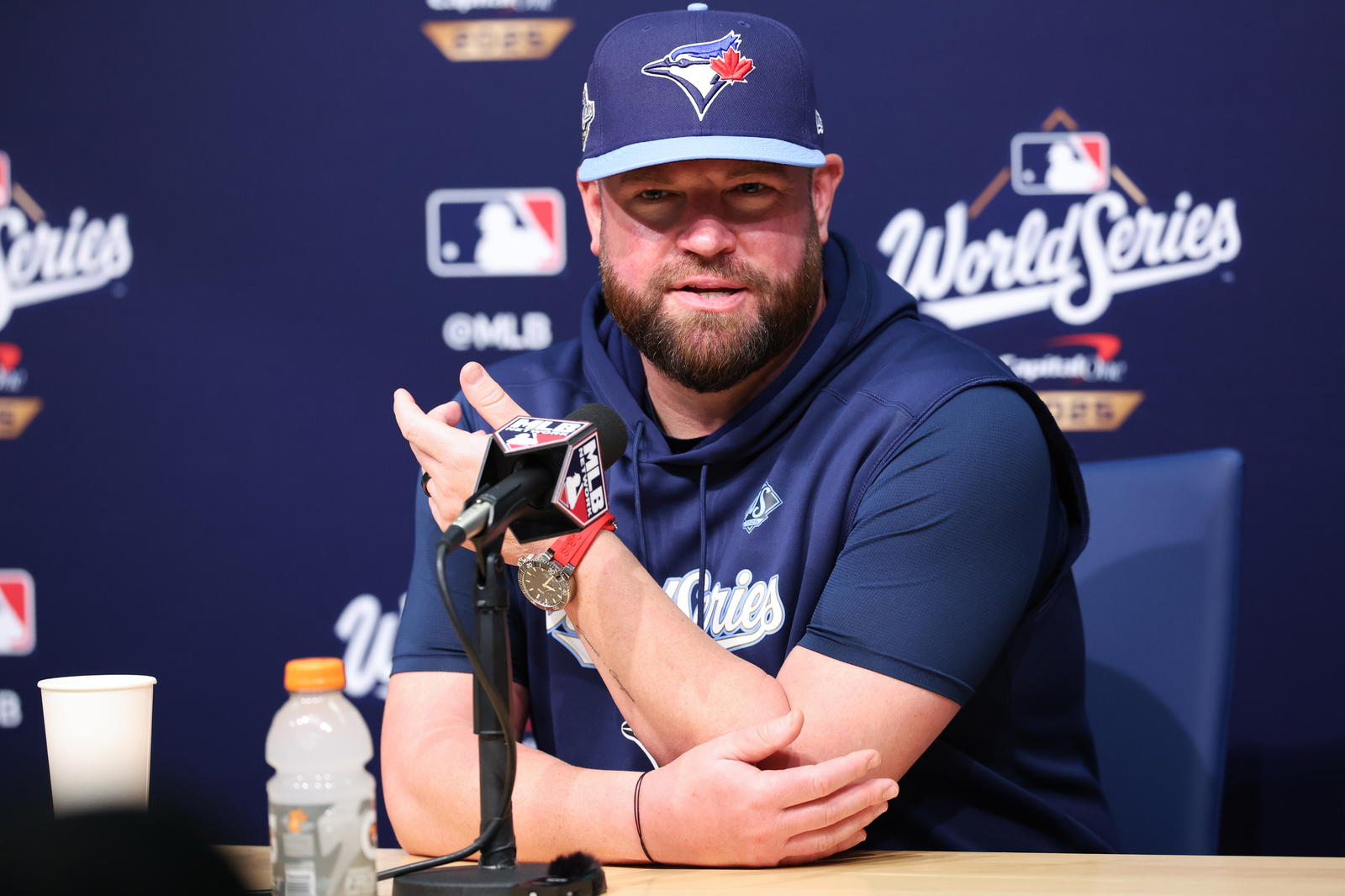 Toronto Blue Jays manager John Schneider (14) speaks at the postgame press conference after the game against the Los Angeles Dodgers during game four of the 2025 MLB World Series at Dodger Stadium. Kiyoshi Mio-Imagn Images
