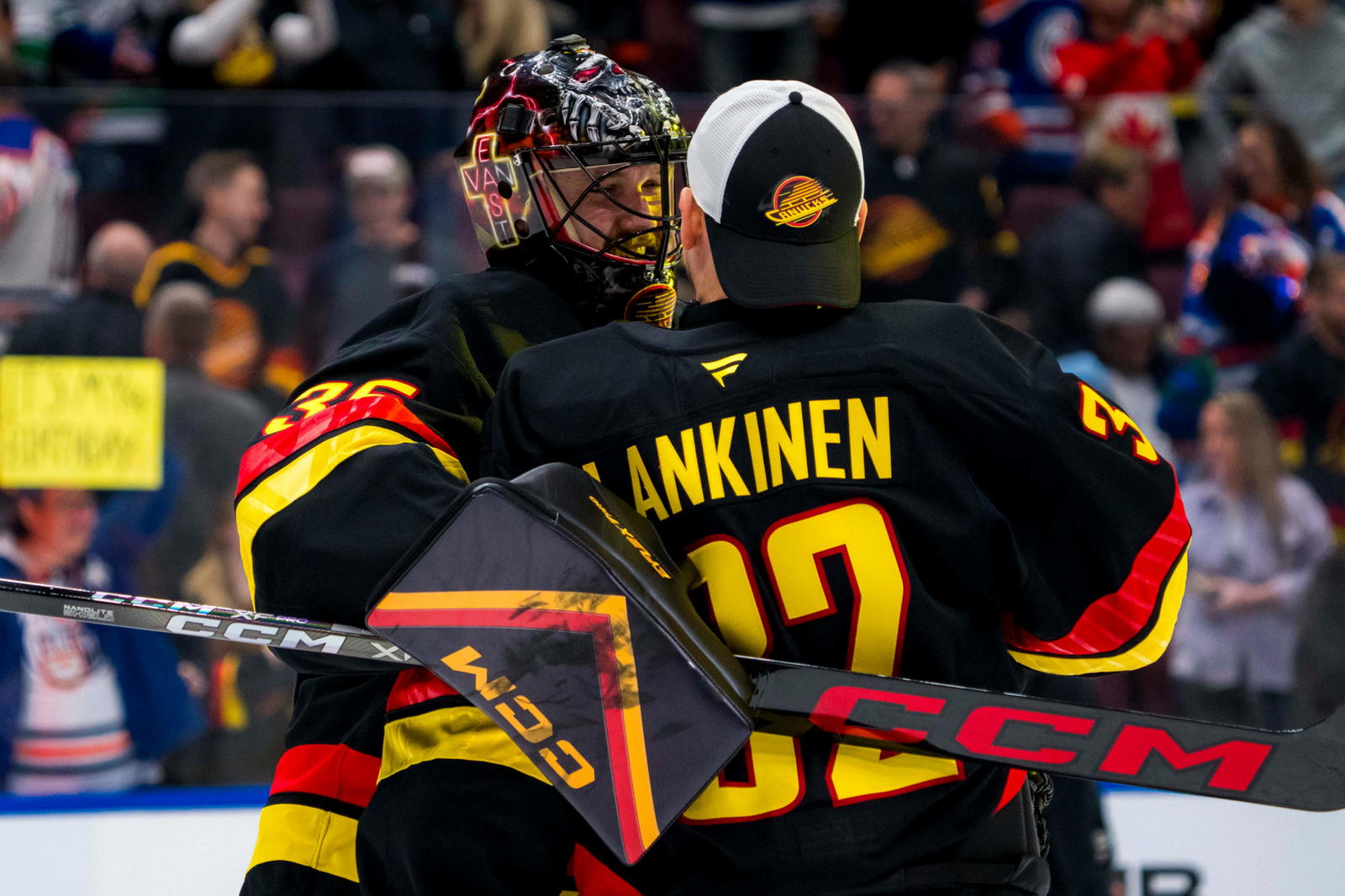 Jan 18, 2025; Vancouver, British Columbia, CAN; Vancouver Canucks goalie Thatcher Demko (35) and goalie Kevin Lankinen (32) celebrate their victory against the Edmonton Oilers at Rogers Arena. Mandatory Credit: Bob Frid-Imagn Images