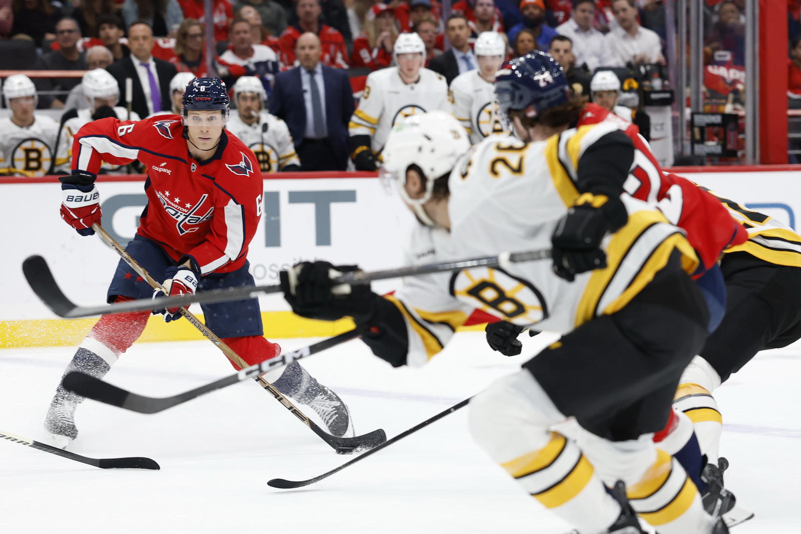 Oct 8, 2025; Washington, District of Columbia, USA; Washington Capitals defenseman Jakob Chychrun (6) /sw/ as Boston Bruins center Elias Lindholm (28) chases during the first period at Capital One Arena. Mandatory Credit: Geoff Burke-Imagn Images