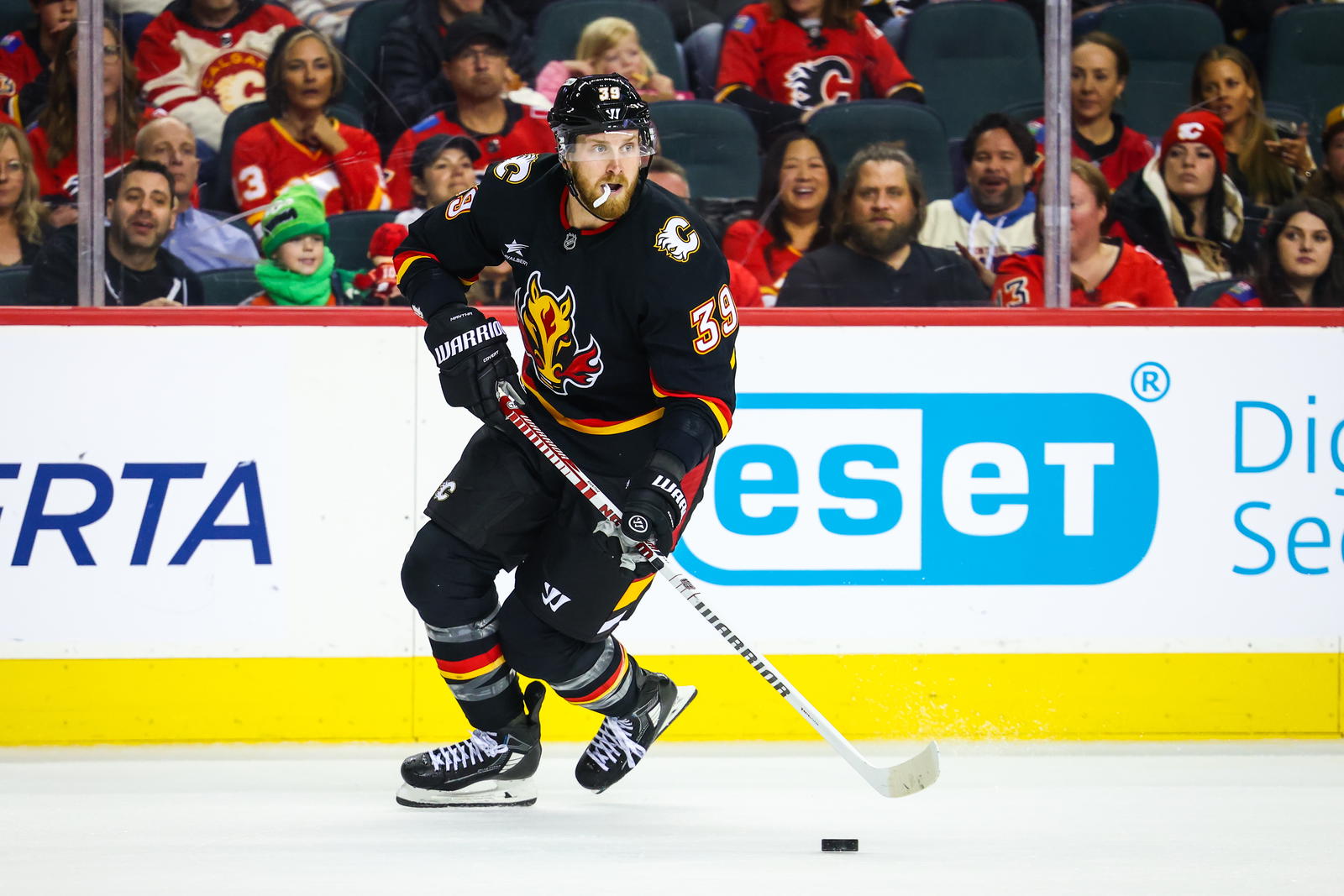 Oct 26, 2024; Calgary, Alberta, CAN; Calgary Flames right wing Anthony Mantha (39) skates with the puck against the Winnipeg Jets during the second period at Scotiabank Saddledome. Mandatory Credit: Sergei Belski-Imagn Images