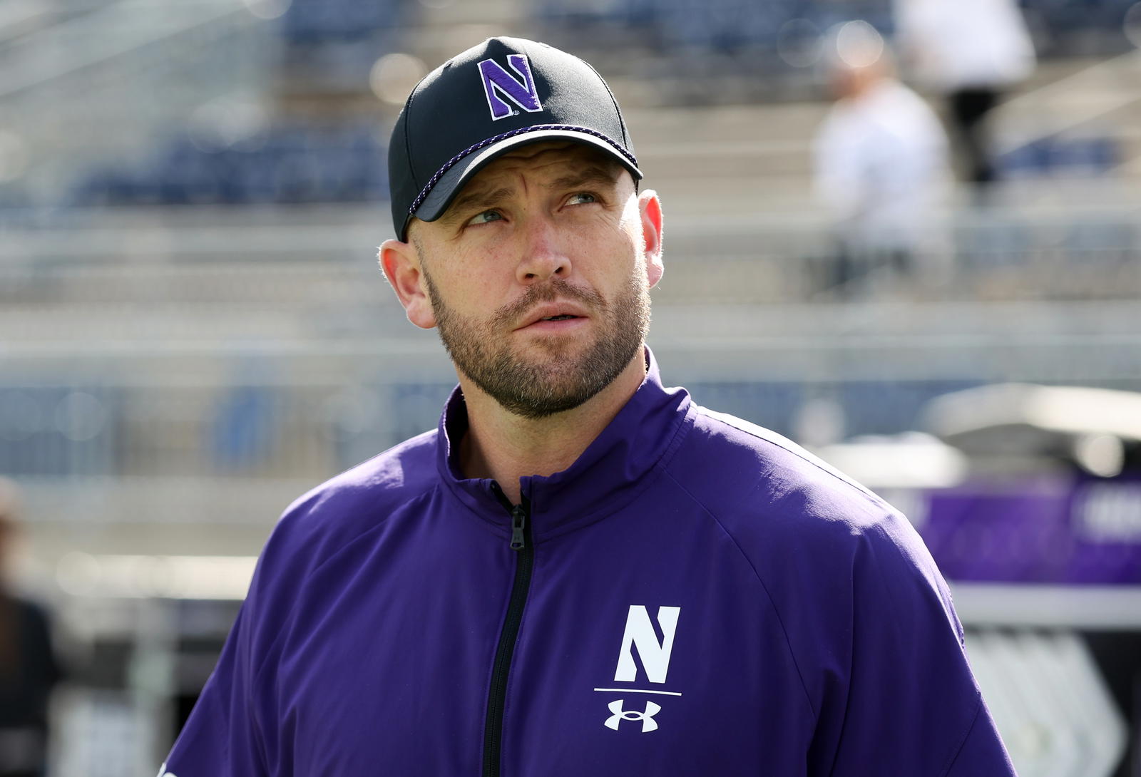 Oct 11, 2025; University Park, Pennsylvania, USA; Northwestern Wildcats head coach David Braun looks on from the field prior to the game against the Penn State Nittany Lions at Beaver Stadium. Mandatory Credit: Matthew O'Haren-Imagn Images
