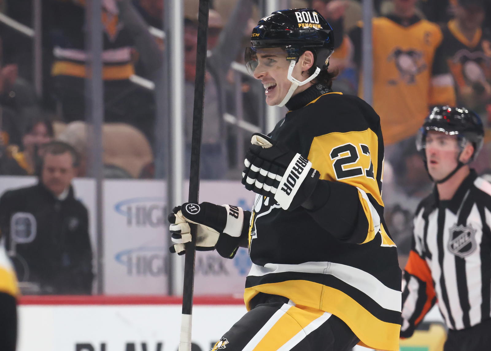Mar 13, 2025; Pittsburgh, Pennsylvania, USA; Pittsburgh Penguins defenseman Ryan Graves (27) reacts after scoring a goal against the St. Louis Blues during the first period at PPG Paints Arena. Mandatory Credit: Charles LeClaire-Imagn Images