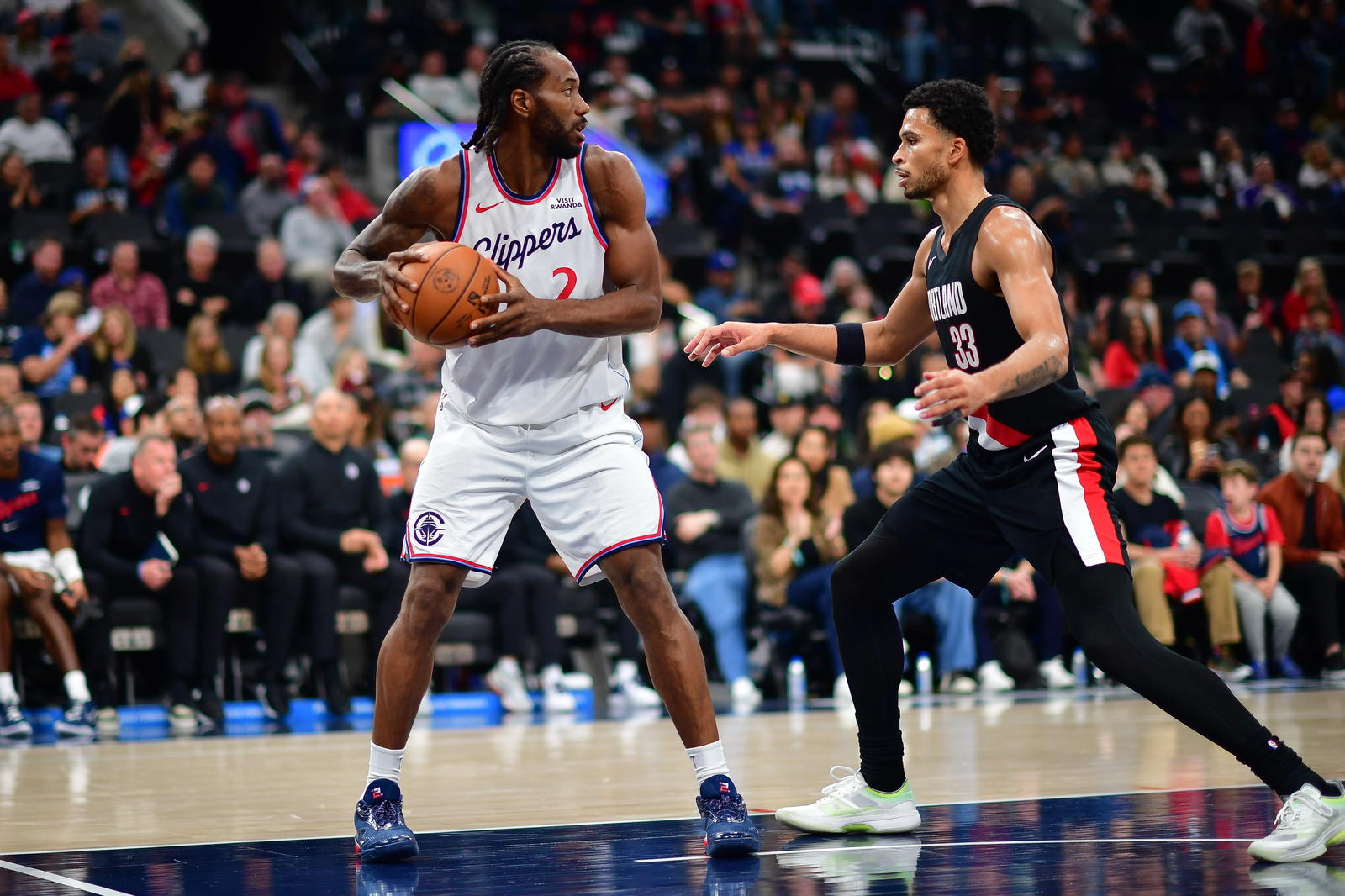 Los Angeles Clippers forward Kawhi Leonard (2) controls the ball against Portland Trail Blazers forward Toumani Camara (33) during the second half at Intuit Dome.&nbsp;Gary A. Vasquez-Imagn Images