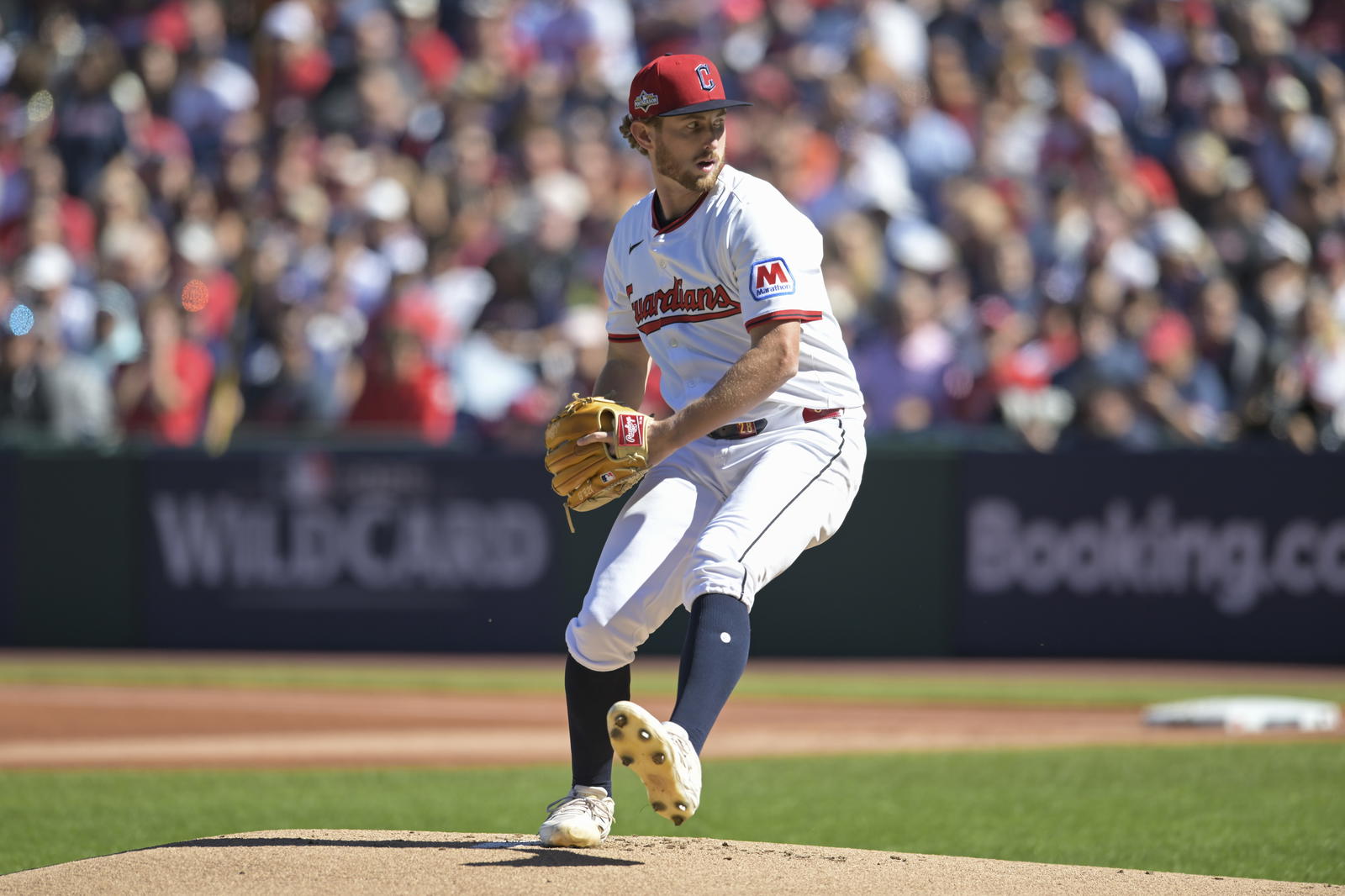 Oct 1, 2025; Cleveland, Ohio, USA; Cleveland Guardians starting pitcher Tanner Bibee (28) delivers a pitch against Detroit Tigers in the first inning during game two of the Wildcard round for the 2025 MLB playoffs at Progressive Field. Mandatory Credit: Ken Blaze-Imagn Images