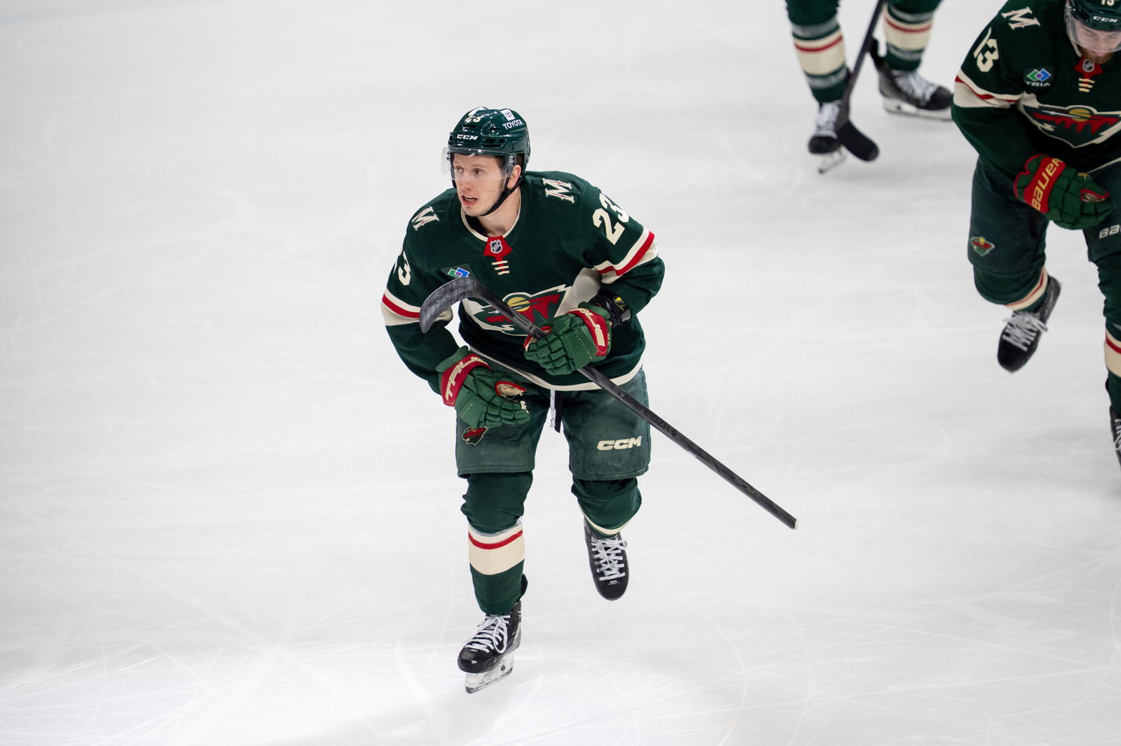 Apr 24, 2025; Saint Paul, Minnesota, USA; Minnesota Wild center Marco Rossi (23) leads the team to the bench after scoring against the Vegas Golden Knights in the first period in game three of the first round of the 2025 Stanley Cup Playoffs at Xcel Energy Center. Mandatory Credit: Matt Blewett-Imagn Images.