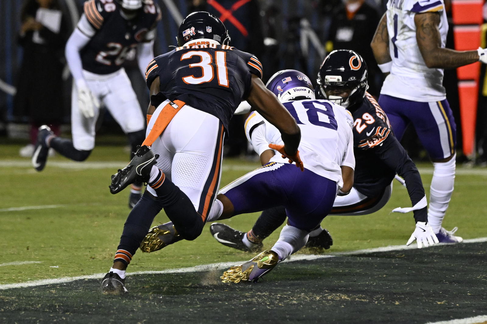 Minnesota Vikings wide receiver Justin Jefferson (18) catches a touchdown pass against Chicago Bears safety Kevin Byard III (31) during the second half at Soldier Field. <br>Matt Marton-Imagn Images