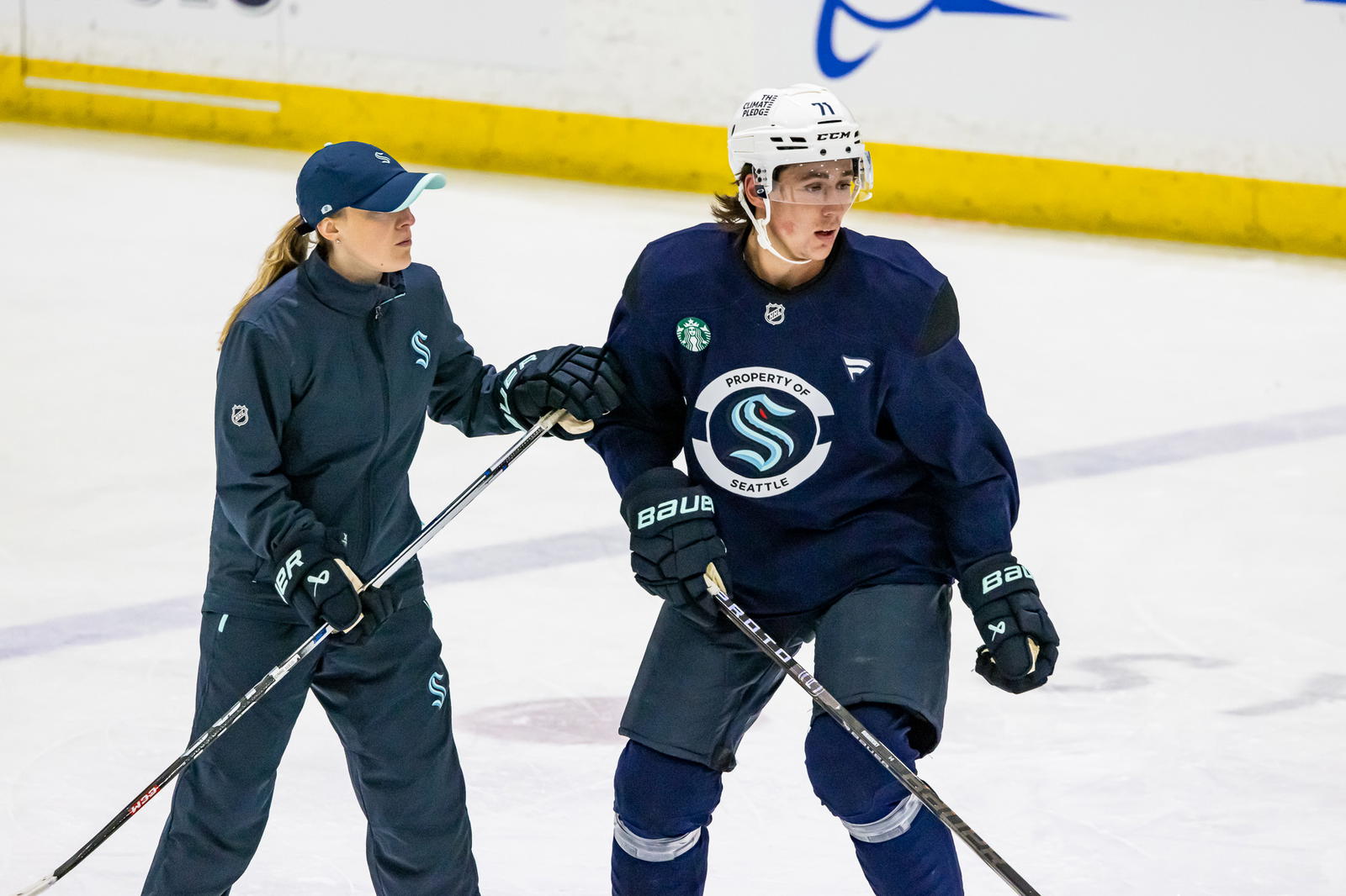 3rd Round pick (68th Overall) Will Reynolds (71) working with Kraken Player Development Coach, Katelyn Parker, during defensive drills. Photo by - Andy Glass