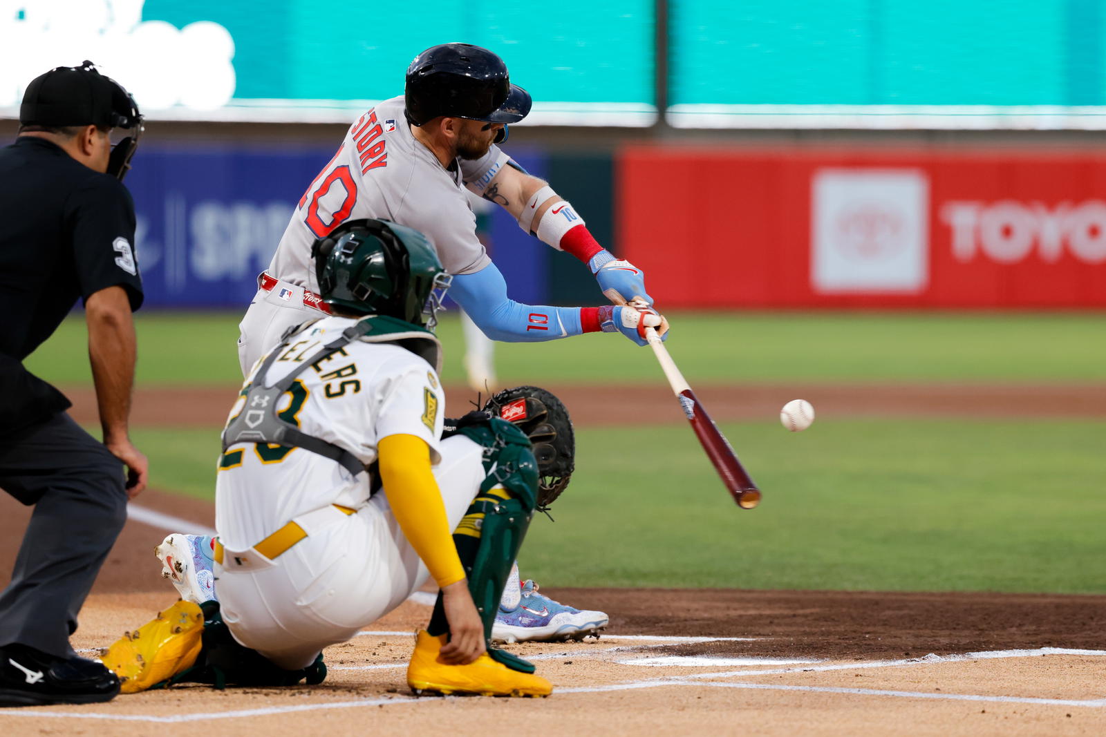 Boston Red Sox shortstop Trevor Story (10) singles during the first inning against the Athletics at Sutter Health Park. Sergio Estrada-Imagn Images